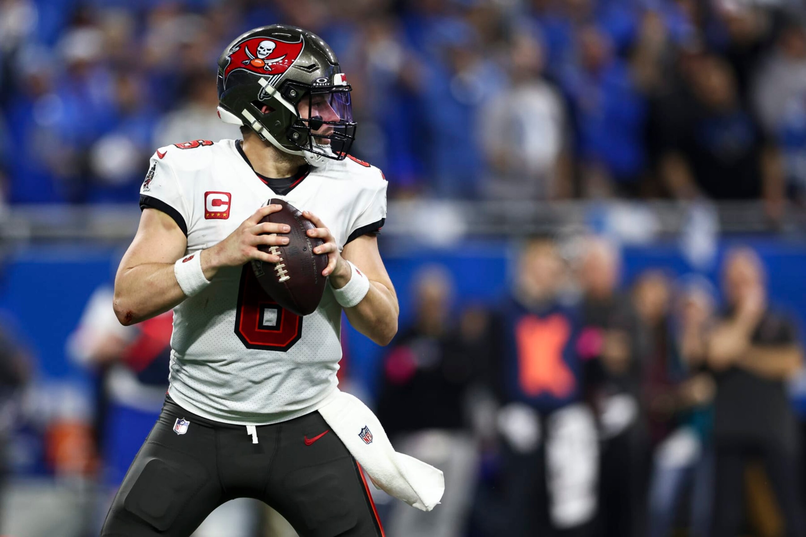 DETROIT, MI - JANUARY 21: Baker Mayfield #6 of the Tampa Bay Buccaneers drops back to pass during the fourth quarter of an NFL divisional round playoff football game against the Detroit Lions at Ford Field on January 21, 2024 in Detroit, Michigan. (Photo by Kevin Sabitus/Getty Images)