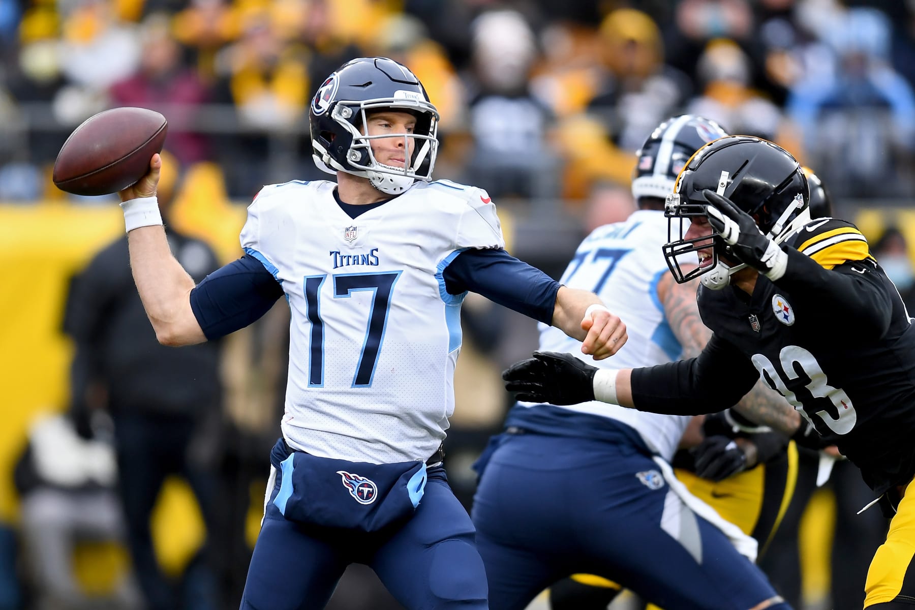 PITTSBURGH, PENNSYLVANIA - DECEMBER 19: Ryan Tannehill #17 of the Tennessee Titans looks to pass over pressure by Joe Schobert #93 of the Pittsburgh Steelers in the second quarter of the game at Heinz Field on December 19, 2021 in Pittsburgh, Pennsylvania. (Photo by Joe Sargent/Getty Images)