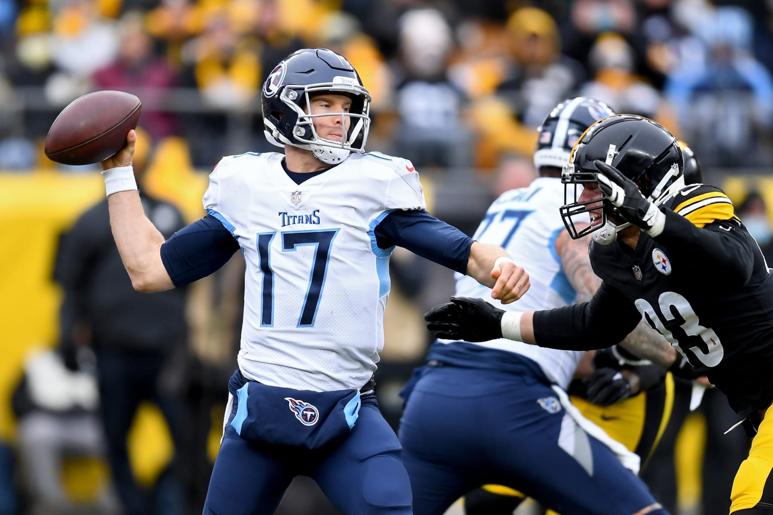 PITTSBURGH, PENNSYLVANIA - DECEMBER 19: Ryan Tannehill #17 of the Tennessee Titans looks to pass over pressure by Joe Schobert #93 of the Pittsburgh Steelers in the second quarter of the game at Heinz Field on December 19, 2021 in Pittsburgh, Pennsylvania. (Photo by Joe Sargent/Getty Images)