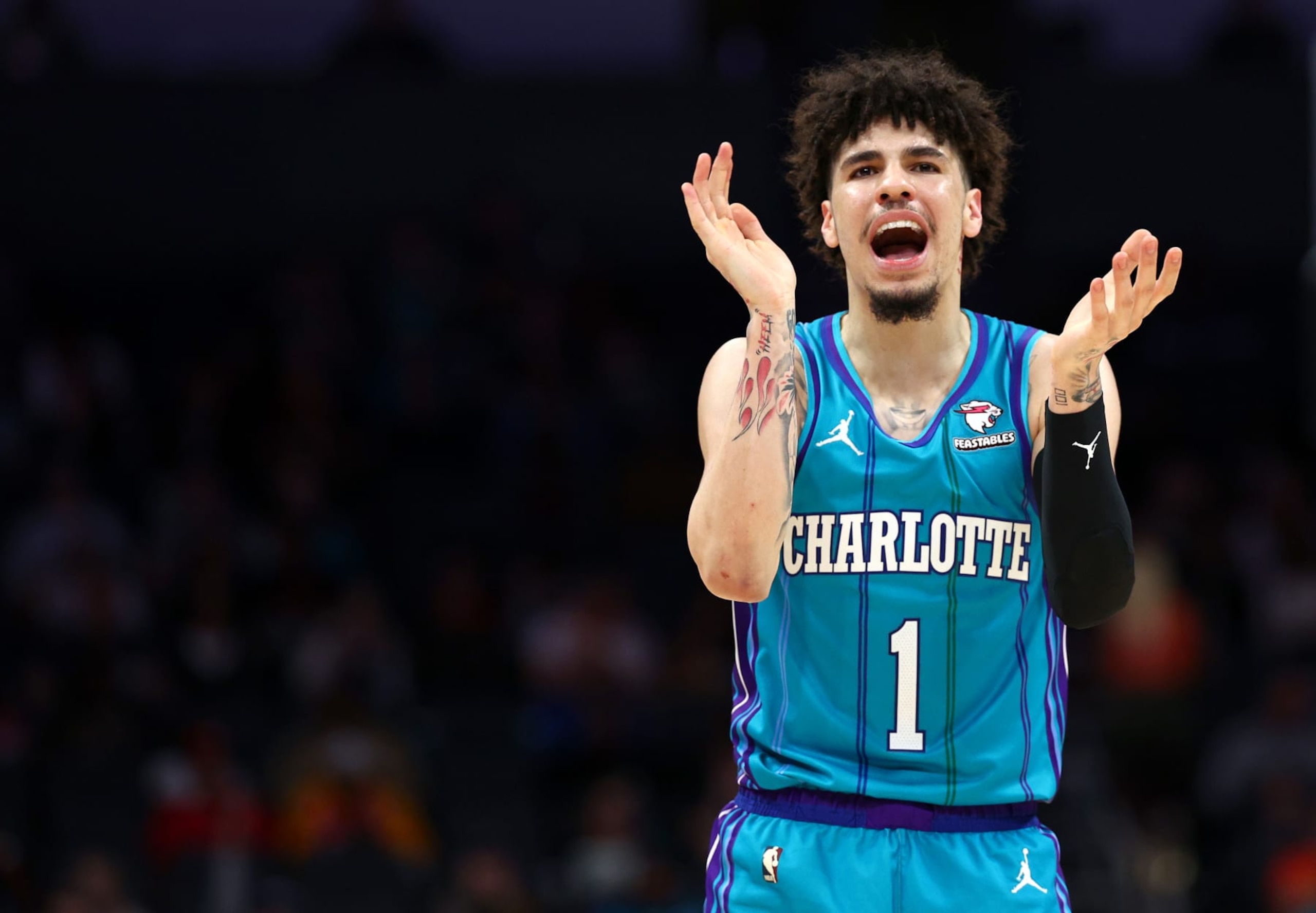 CHARLOTTE, NORTH CAROLINA - JANUARY 26: LaMelo Ball #1 of the Charlotte Hornets reacts during the second half of the game against the Houston Rockets at Spectrum Center on January 26, 2024 in Charlotte, North Carolina. NOTE TO USER: User expressly acknowledges and agrees that, by downloading and or using this photograph, User is consenting to the terms and conditions of the Getty Images License Agreement. (Photo by Jared C. Tilton/Getty Images) CHARLOTTE, NORTH CAROLINA - JANUARY 26: LaMelo Ball #1 of the Charlotte Hornets reacts during the second half of the game against the Houston Rockets at Spectrum Center on January 26, 2024 in Charlotte, North Carolina. NOTE TO USER: User expressly acknowledges and agrees that, by downloading and or using this photograph, User is consenting to the terms and conditions of the Getty Images License Agreement. (Photo by Jared C. Tilton/Getty Images)