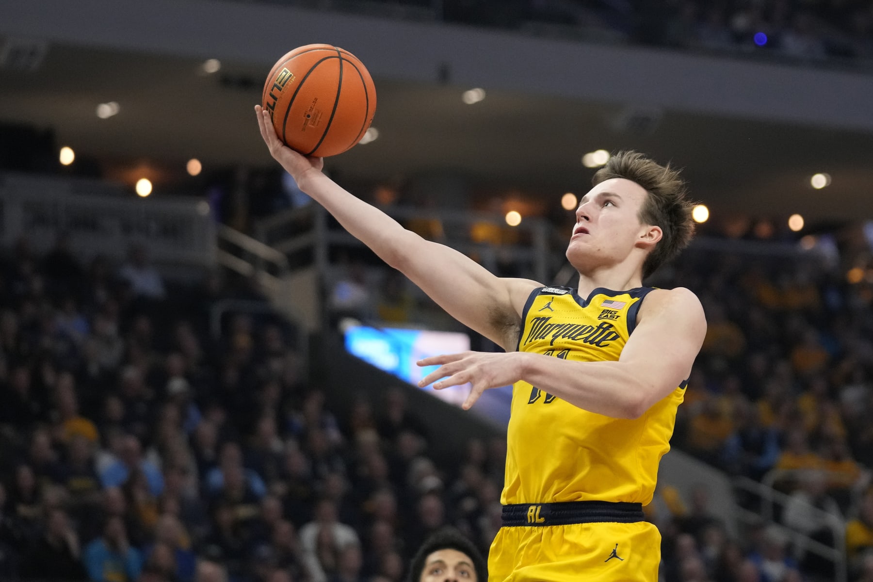 MILWAUKEE, WISCONSIN - FEBRUARY 10: Tyler Kolek #11 of the Marquette Golden Eagles shoots the ball against the St. John's Red Storm during the first half at Fiserv Forum on February 10, 2024 in Milwaukee, Wisconsin. (Photo by Patrick McDermott/Getty Images)