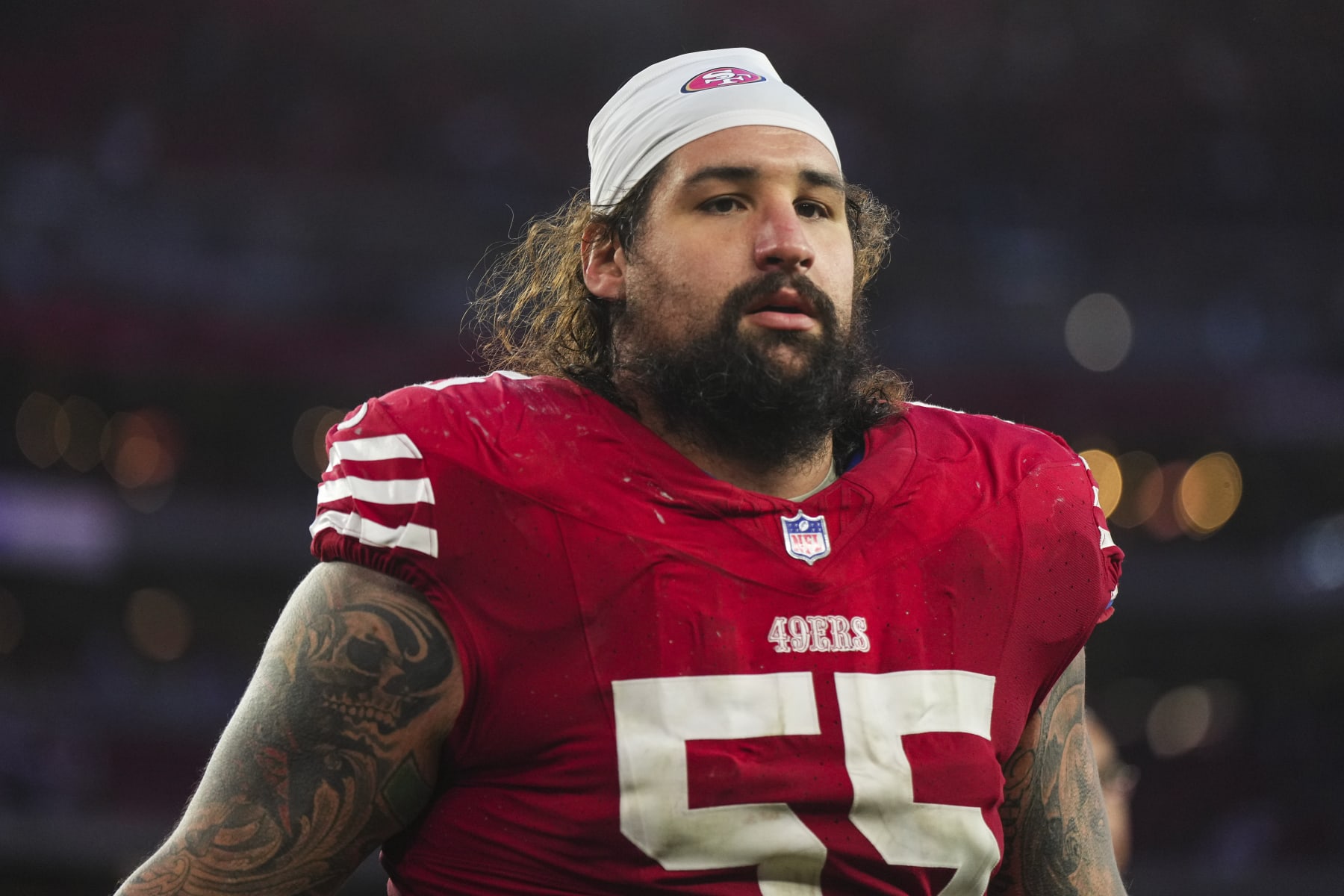 GLENDALE, AZ - DECEMBER 17: Jon Feliciano #55 of the San Francisco 49ers walks off of the field after an NFL football game against the Arizona Cardinals at State Farm Stadium on December 17, 2023 in Glendale, Arizona. (Photo by Cooper Neill/Getty Images)