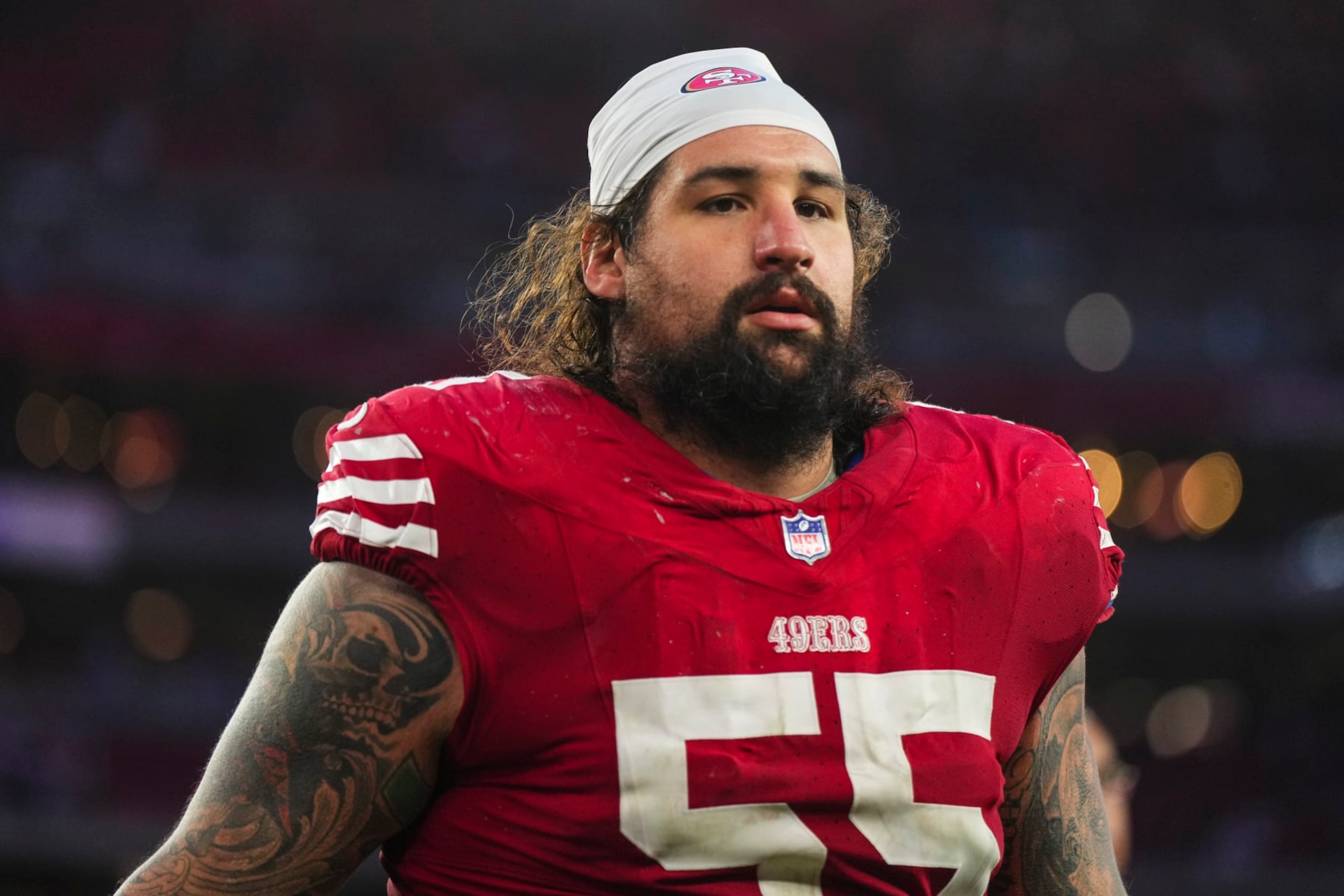 GLENDALE, AZ - DECEMBER 17: Jon Feliciano #55 of the San Francisco 49ers walks off of the field after an NFL football game against the Arizona Cardinals at State Farm Stadium on December 17, 2023 in Glendale, Arizona. (Photo by Cooper Neill/Getty Images)
