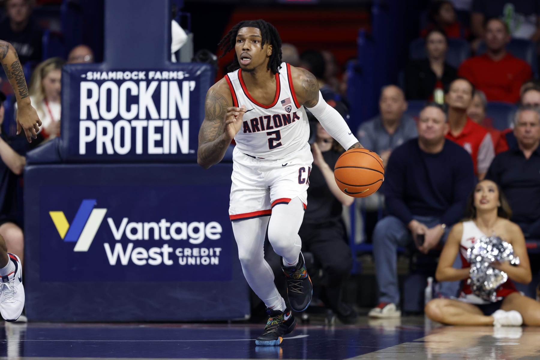 TUCSON, ARIZONA - FEBRUARY 01: Caleb Love #2 of the Arizona Wildcats controls the ball during the game against the California Golden Bears at McKale Center on February 01, 2024 in Tucson, Arizona. The Wildcats defeated the Golden Bears 91-65. (Photo by Chris Coduto/Getty Images)