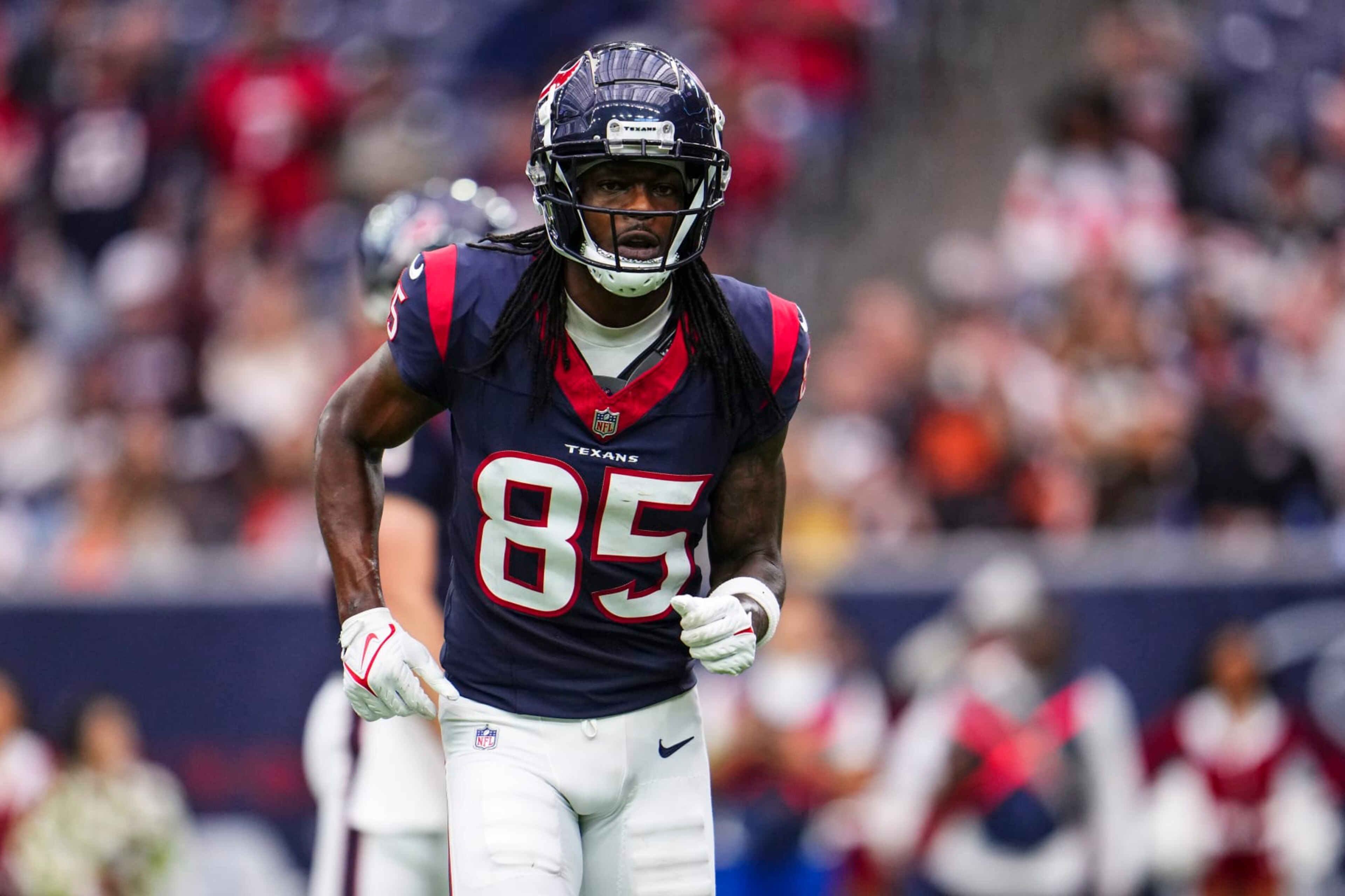 HOUSTON, TX - DECEMBER 24: Noah Brown #85 of the Houston Texans runs across the field during an NFL football game against the Cleveland Browns at NRG Stadium on December 24, 2023 in Houston, Texas. (Photo by Cooper Neill/Getty Images)