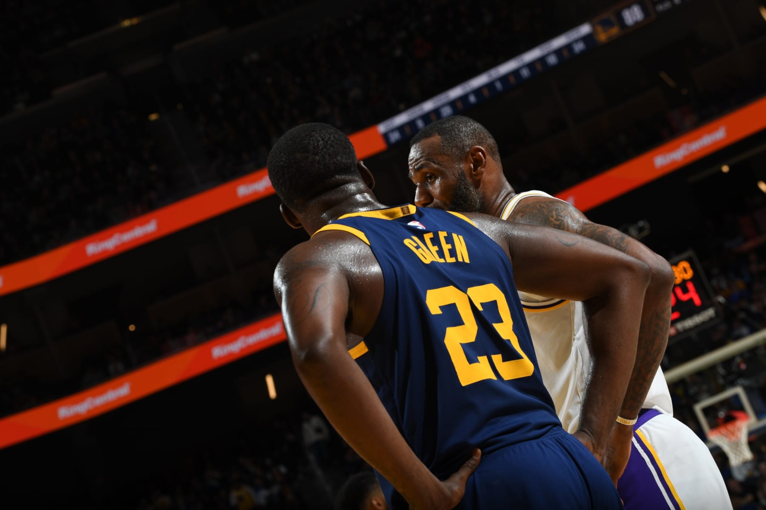 SAN FRANCISCO, CA - JANUARY 27: LeBron James #23 of the Los Angeles Lakers talks with Draymond Green #23 of the Golden State Warriors during the game on January 27, 2024 at Chase Center in San Francisco, California. NOTE TO USER: User expressly acknowledges and agrees that, by downloading and or using this photograph, user is consenting to the terms and conditions of Getty Images License Agreement. Mandatory Copyright Notice: Copyright 2024 NBAE (Photo by Noah Graham/NBAE via Getty Images)