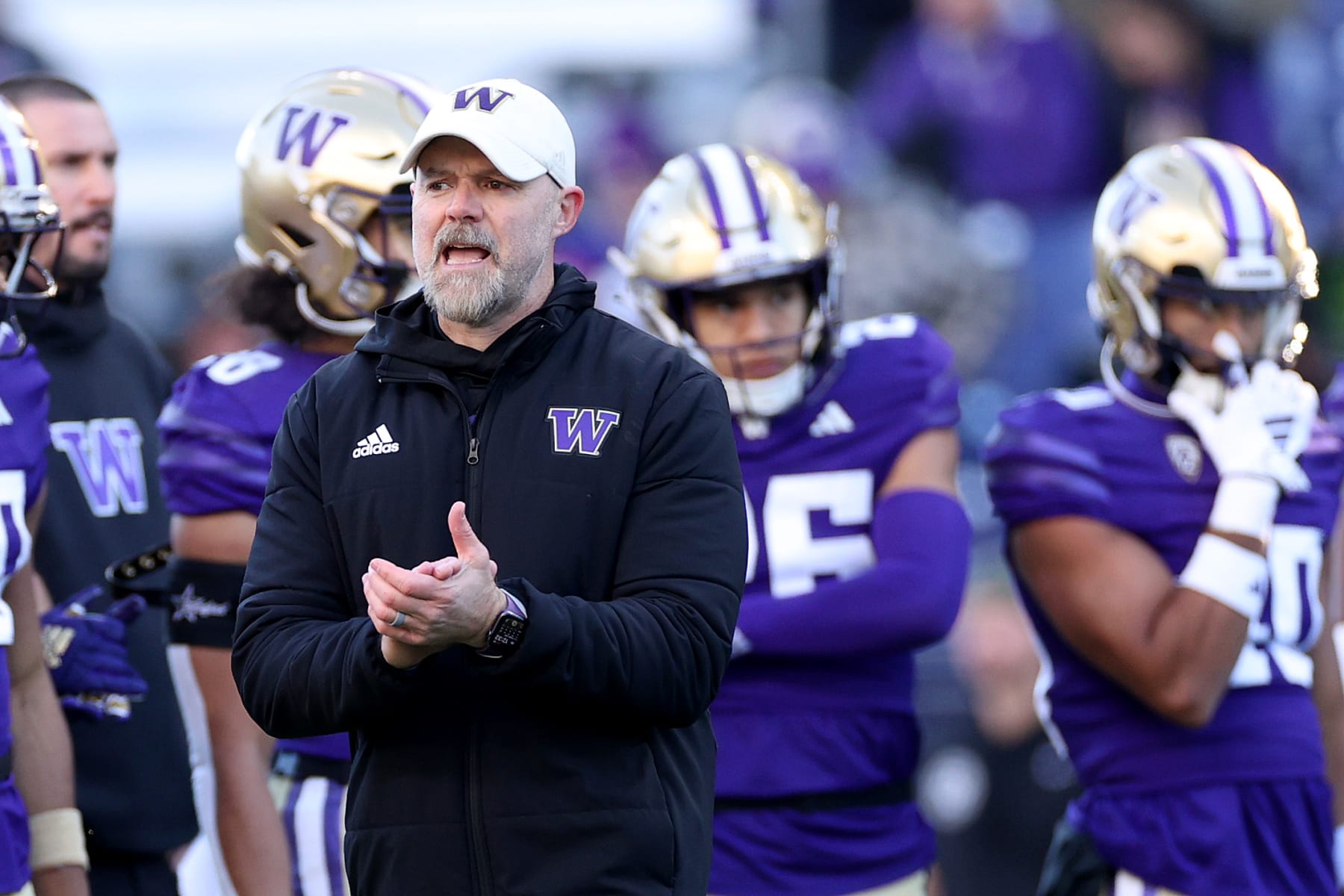 SEATTLE, WASHINGTON - NOVEMBER 25: Offensive coordinator Ryan Grubb of the Washington Huskies looks on during warmups before the game against the Washington State Cougarsat Husky Stadium on November 25, 2023 in Seattle, Washington. (Photo by Steph Chambers/Getty Images)