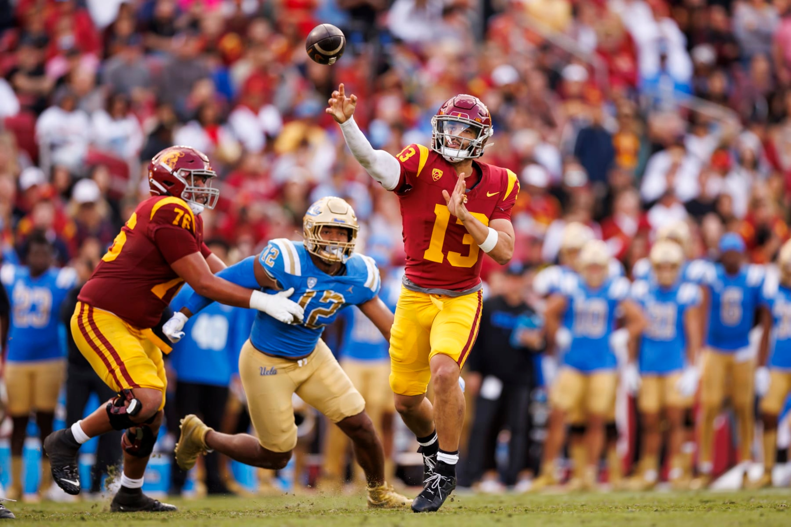 LOS ANGELES, CALIFORNIA - NOVEMBER 18: Caleb Williams #13 of the USC Trojans drops back and looks to throw a pass during the first half of a game against the UCLA Bruins at United Airlines Field at the Los Angeles Memorial Coliseum on November 18, 2023 in Los Angeles, California. (Photo by Ryan Kang/Getty Images) LOS ANGELES, CALIFORNIA - NOVEMBER 18: Caleb Williams #13 of the USC Trojans drops back and looks to throw a pass during the first half of a game against the UCLA Bruins at United Airlines Field at the Los Angeles Memorial Coliseum on November 18, 2023 in Los Angeles, California. (Photo by Ryan Kang/Getty Images)
