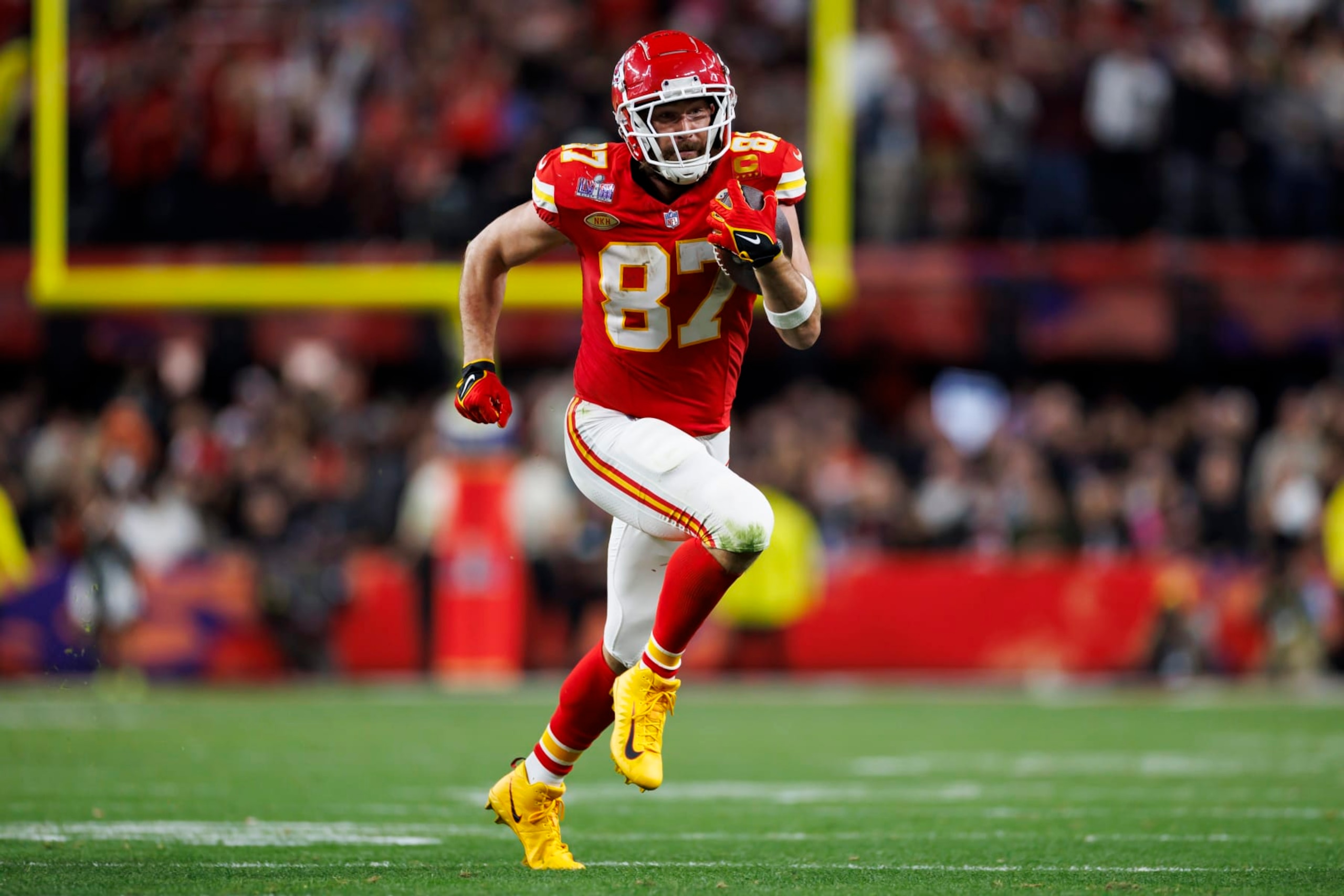 LAS VEGAS, NEVADA - FEBRUARY 11: Travis Kelce #87 of the Kansas City Chiefs runs the ball after a catch during Super Bowl LVIII against the San Francisco 49ers at Allegiant Stadium on February 11, 2024 in Las Vegas, Nevada. (Photo by Ryan Kang/Getty Images)