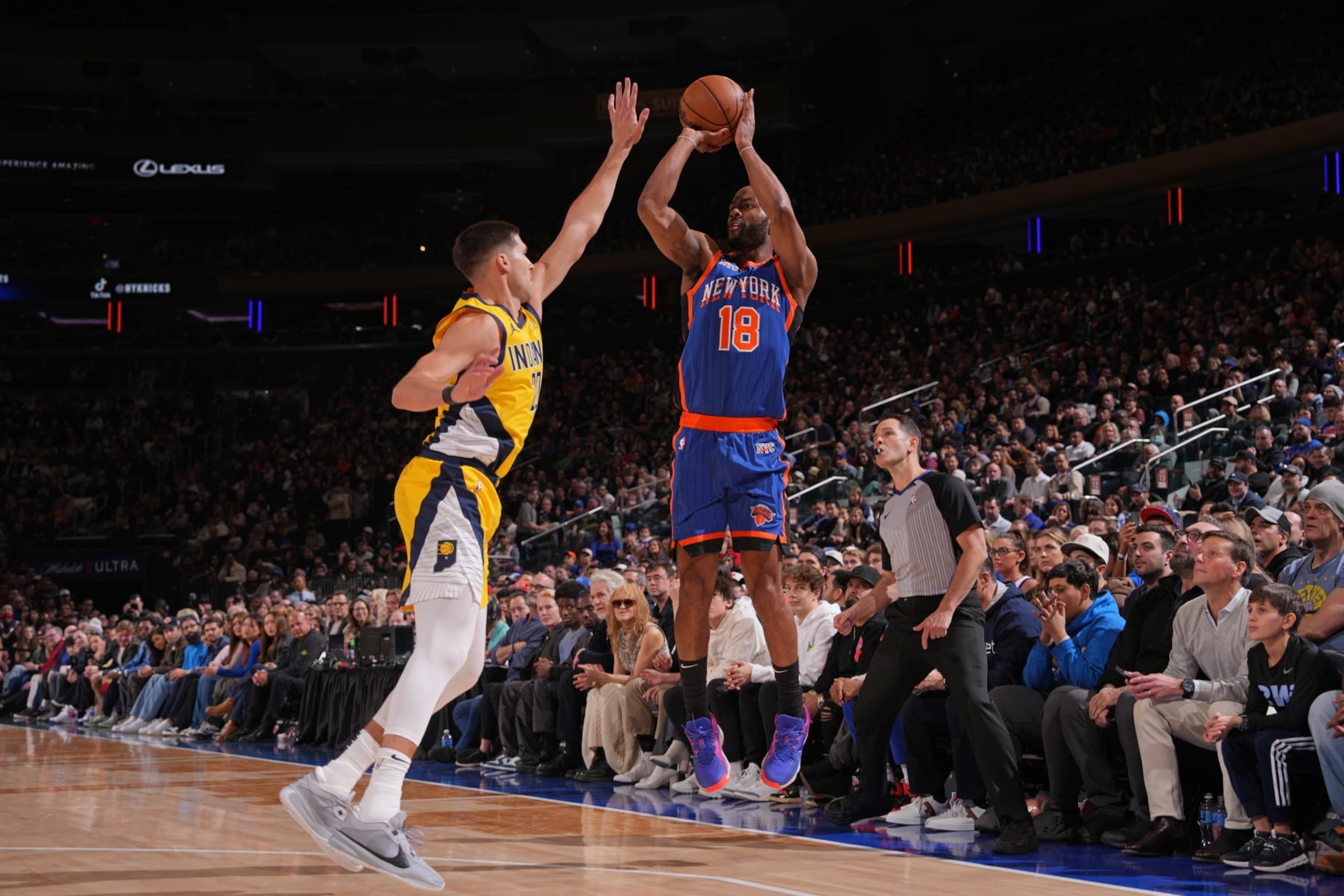 NEW YORK, NY - FEBRUARY 10: Alec Burks #18 of the New York Knicks shoots a three point basket during the game against the Indiana Pacers on February 10, 2024 at Madison Square Garden in New York City, New York.  NOTE TO USER: User expressly acknowledges and agrees that, by downloading and or using this photograph, User is consenting to the terms and conditions of the Getty Images License Agreement. Mandatory Copyright Notice: Copyright 2024 NBAE  (Photo by Jesse D. Garrabrant/NBAE via Getty Images)