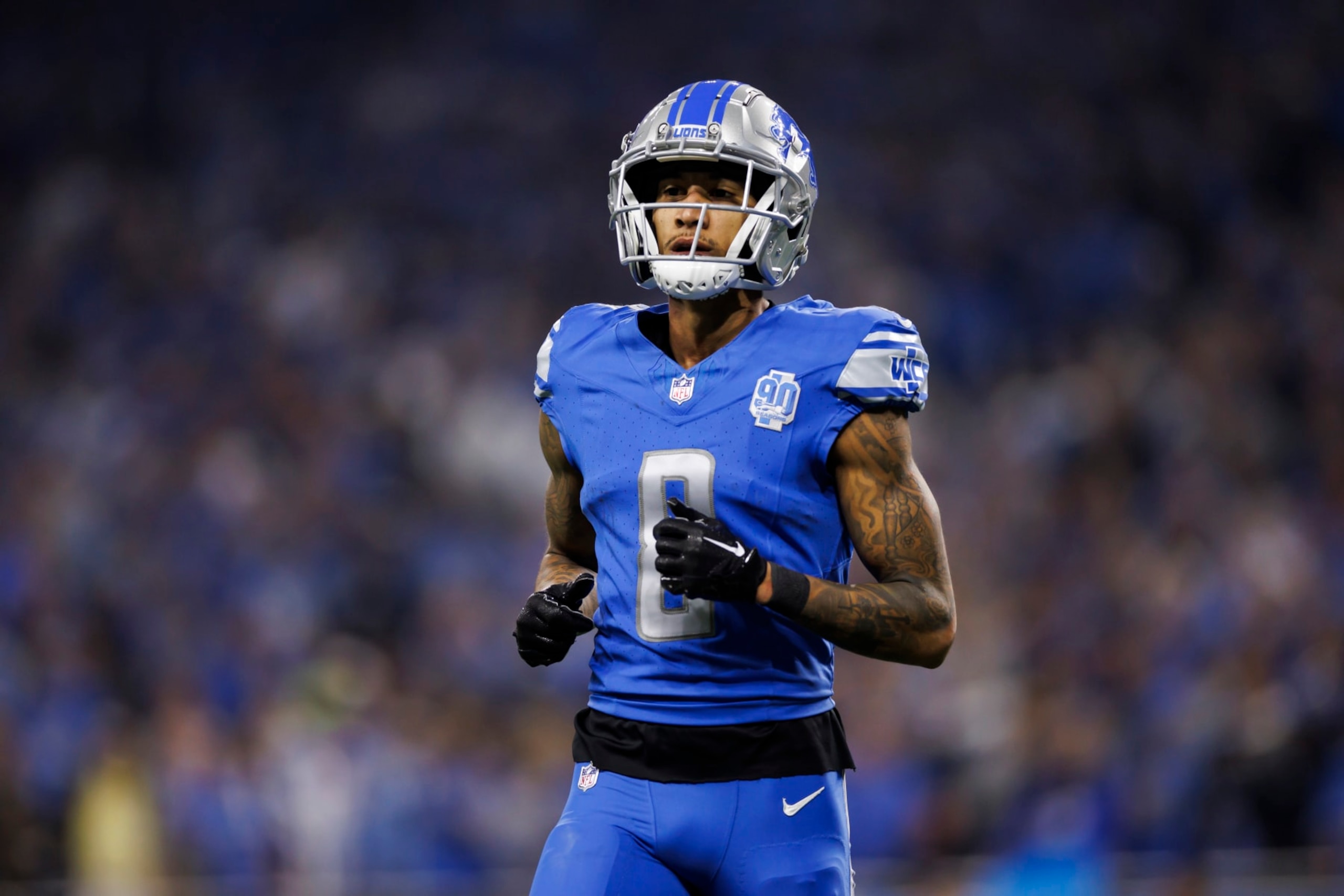 DETROIT, MICHIGAN - JANUARY 14: Josh Reynolds #8 of the Detroit Lions lines up to run a route during an NFC Wild Card Playoff football game against the Los Angeles Rams at Ford Field on January 14, 2024 in Detroit, Michigan. (Photo by Ryan Kang/Getty Images) DETROIT, MICHIGAN - JANUARY 14: Josh Reynolds #8 of the Detroit Lions lines up to run a route during an NFC Wild Card Playoff football game against the Los Angeles Rams at Ford Field on January 14, 2024 in Detroit, Michigan. (Photo by Ryan Kang/Getty Images)