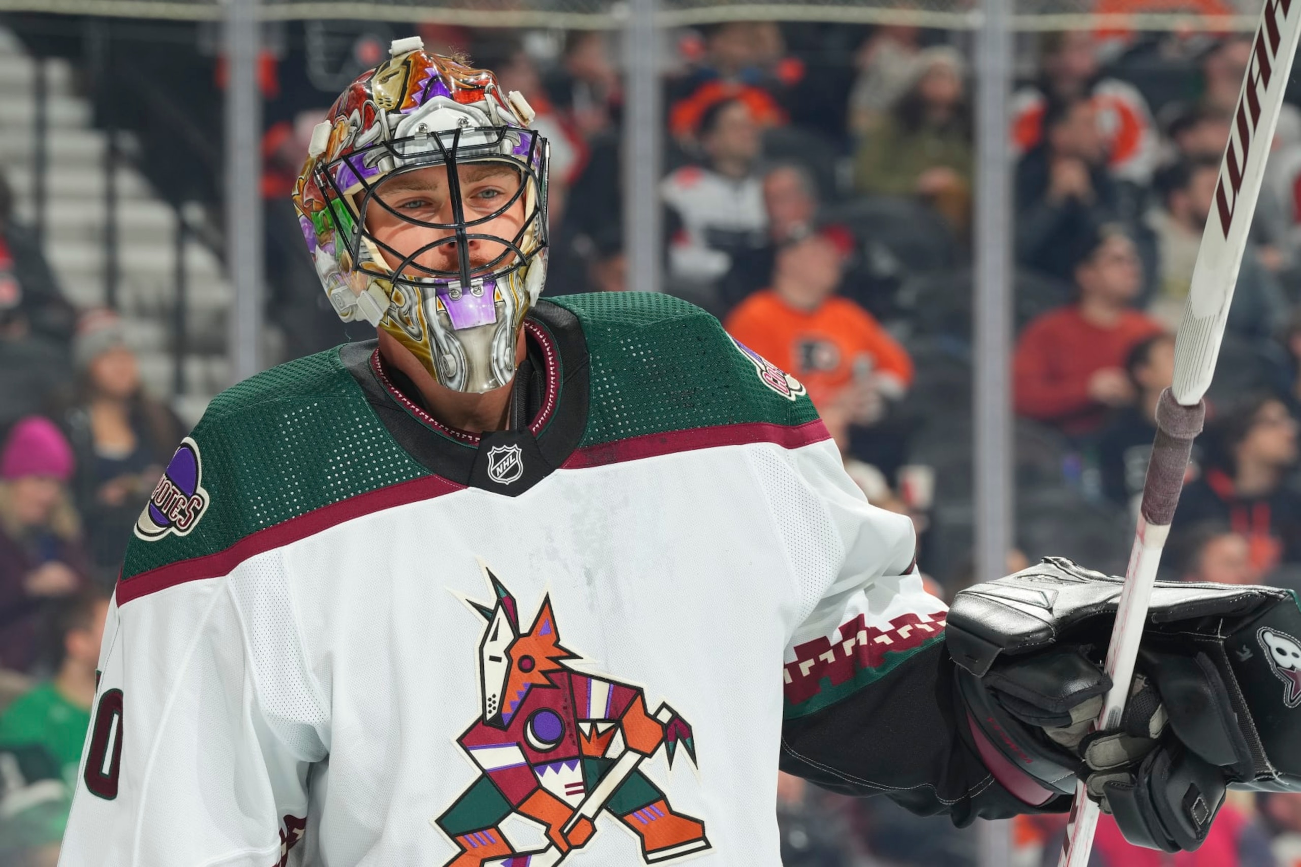 PHILADELPHIA, PENNSYLVANIA - FEBRUARY 12: Karel Vejmelka #70 of the Arizona Coyotes looks on against the Philadelphia Flyers at the Wells Fargo Center on February 12, 2024 in Philadelphia, Pennsylvania. The Flyers defeated the Coyotes 5-3. (Photo by Mitchell Leff/Getty Images)