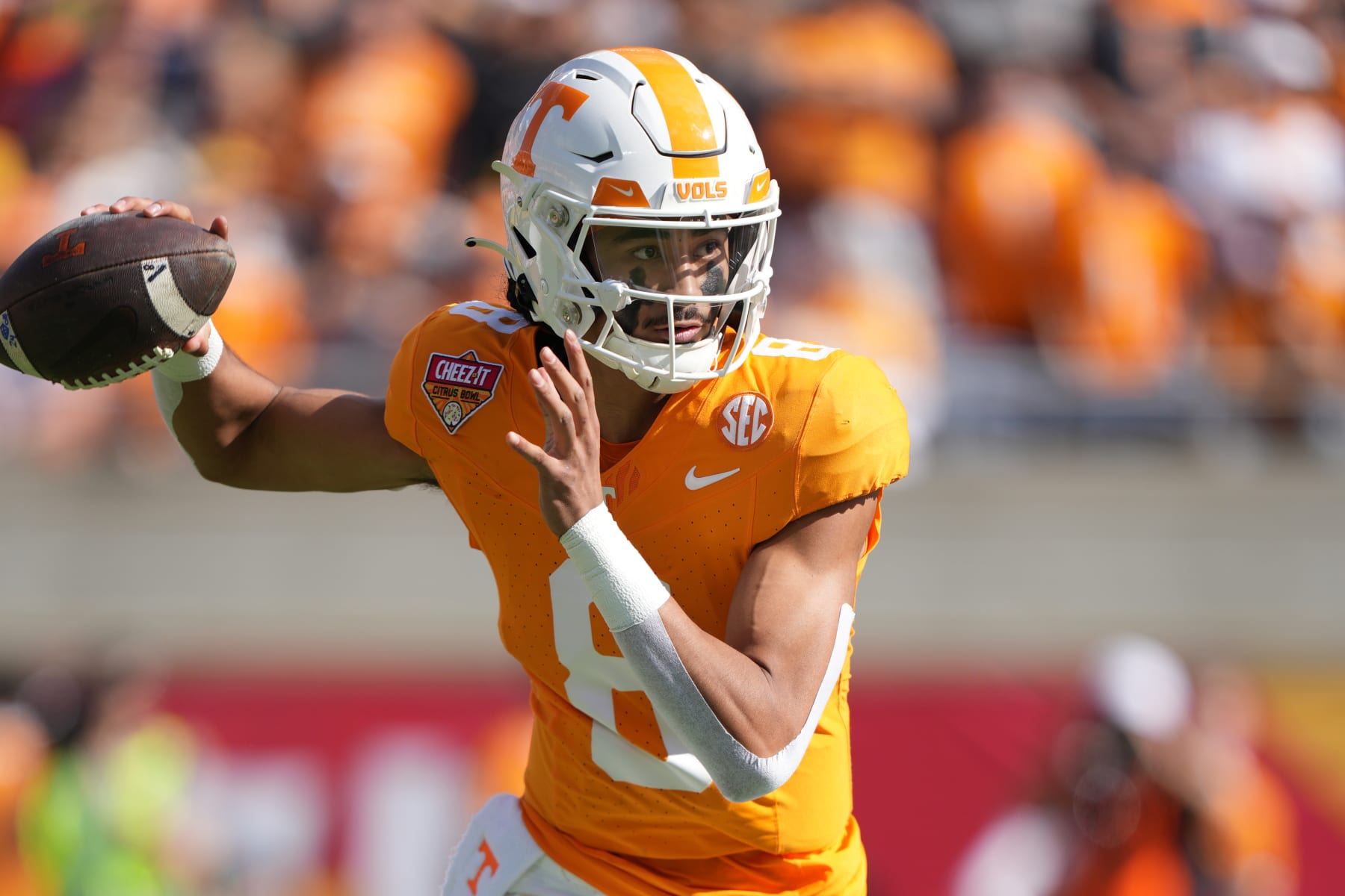 ORLANDO, FL - JANUARY 01: Tennessee Volunteers quarterback Nico Iamaleava (8) makes a pass attempt in the first half during the 2024 Cheez-It Citrus Bowl between Iowa Hawkeyes and the Tennessee Volunteers on Monday, January 1, 2024 at Camping World Stadium, Orlando, Fla. (Photo by Peter Joneleit/Icon Sportswire via Getty Images)