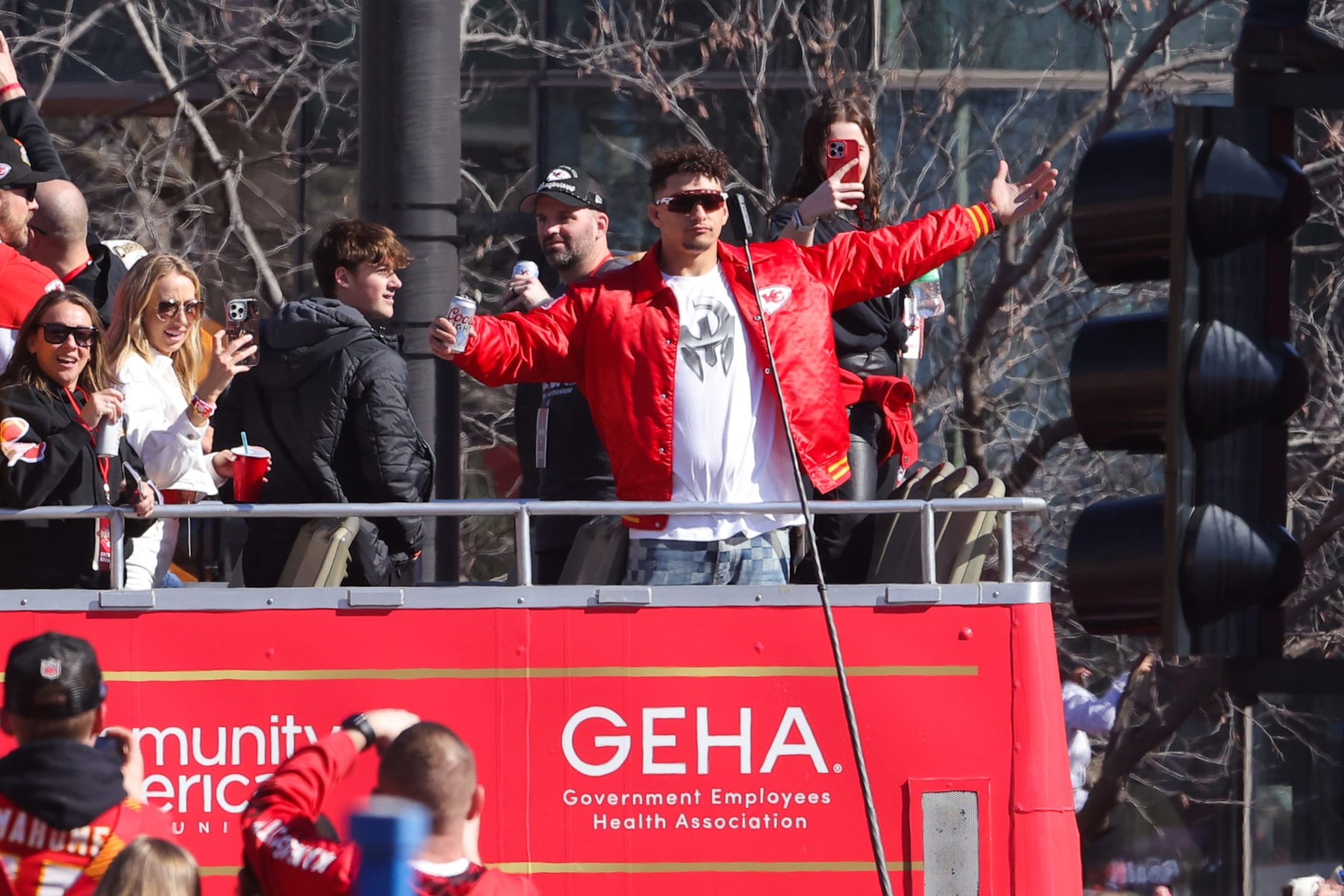 KANSAS CITY, MISSOURI - FEBRUARY 14: Patrick Mahomes #15 of the Kansas City Chiefs celebrates during the Kansas City Chiefs Super Bowl LVIII victory parade on February 14, 2024 in Kansas City, Missouri. (Photo by Jamie Squire/Getty Images)