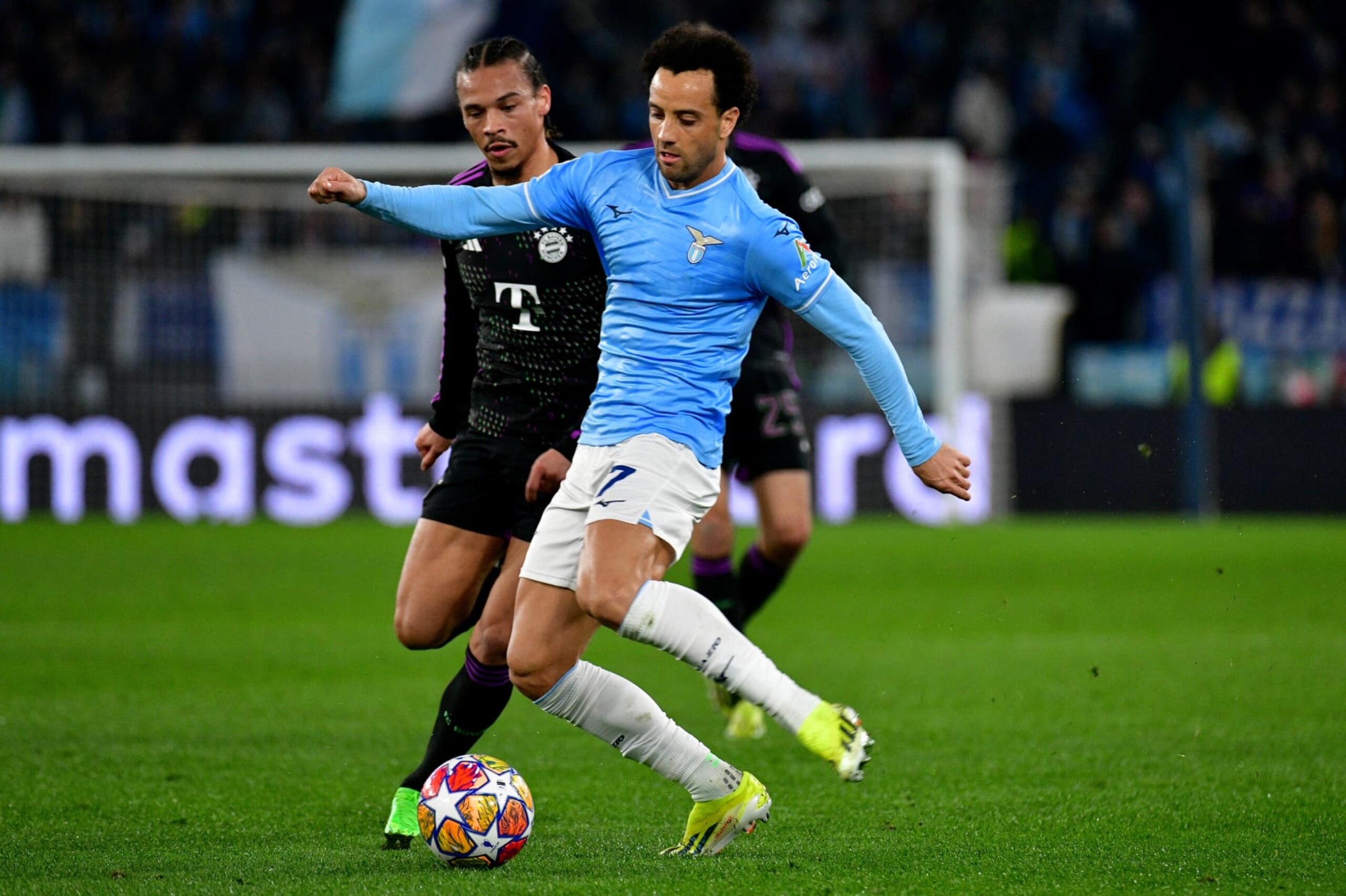 ROME, ITALY - FEBRUARY 13: Felipe Anderson of SS Lazio compete for the ball with Leroy Sanè of Bayern Munchen during the UEFA Champions League match against SS Lazio and Bayern Munchen at Formello sport centre on February 13, 2024 in Rome, Italy. (Photo by Marco Rosi - SS Lazio/Getty Images)