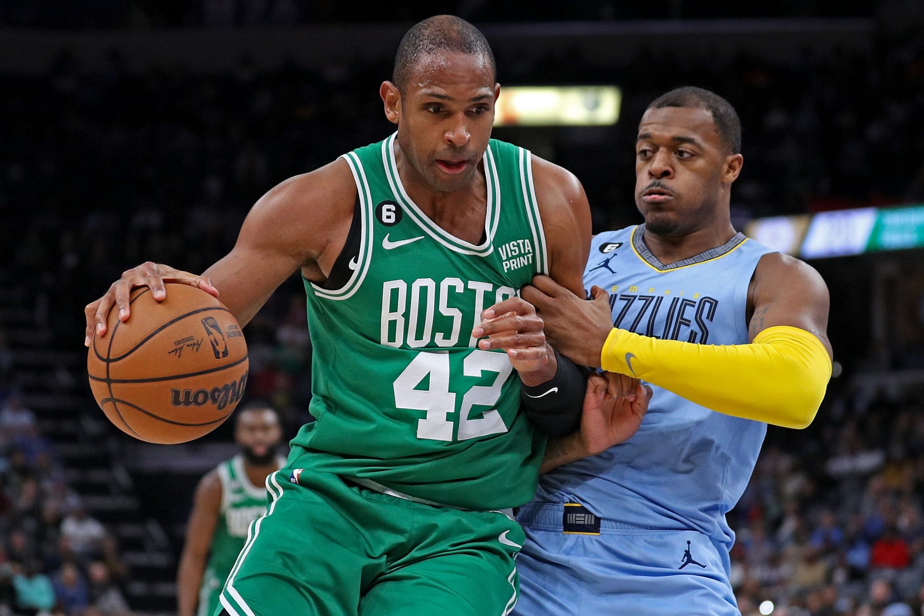 MEMPHIS, TENNESSEE - NOVEMBER 07: Al Horford #42 of the Boston Celtics handles the ball against Xavier Tillman #2 of the Memphis Grizzlies during the first half of the game at FedExForum on November 07, 2022 in Memphis, Tennessee. NOTE TO USER: User expressly acknowledges and agrees that, by downloading and or using this photograph, User is consenting to the terms and conditions of the Getty Images License Agreement. (Photo by Justin Ford/Getty Images)