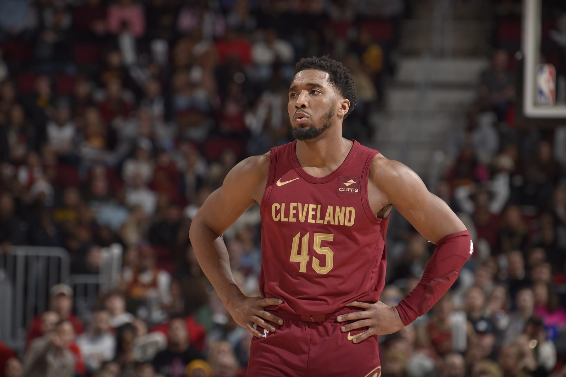 CLEVELAND, OH - FEBRUARY 14: Donovan Mitchell #45 of the Cleveland Cavaliers looks on during the game against the Chicago Bulls on February 14, 2024 at Rocket Mortgage FieldHouse in Cleveland, Ohio. NOTE TO USER: User expressly acknowledges and agrees that, by downloading and/or using this Photograph, user is consenting to the terms and conditions of the Getty Images License Agreement. Mandatory Copyright Notice: Copyright 2024 NBAE (Photo by David Liam Kyle/NBAE via Getty Images)
