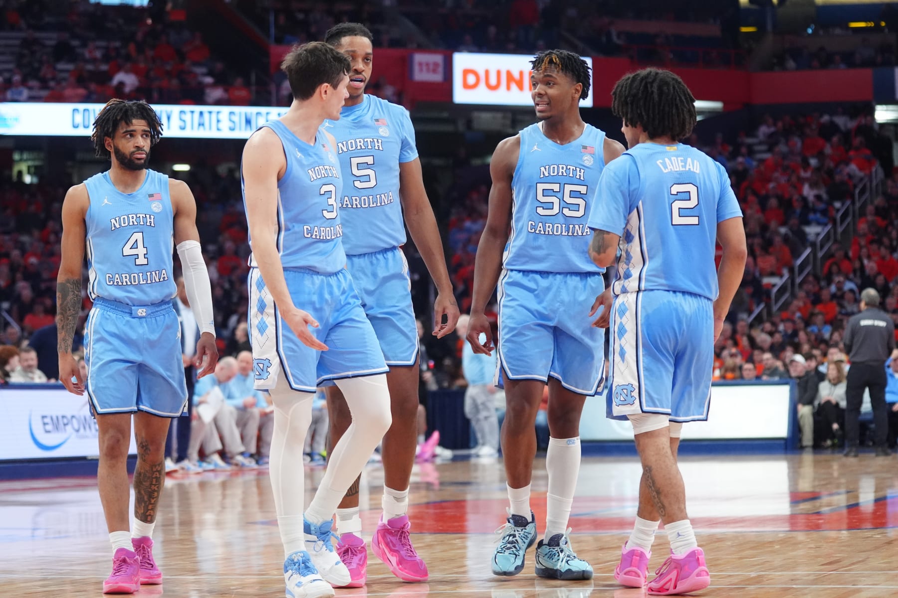 SYRACUSE, NY - FEBRUARY 13:  The North Carolina Tar Heels huddle during the second half of the College Basketball game between the North Carolina Tar Heels and the Syracuse Orange on February 13, 2024, at the JMA Wireless Dome in Syracuse, NY. (Photo by Gregory Fisher/Icon Sportswire via Getty Images)