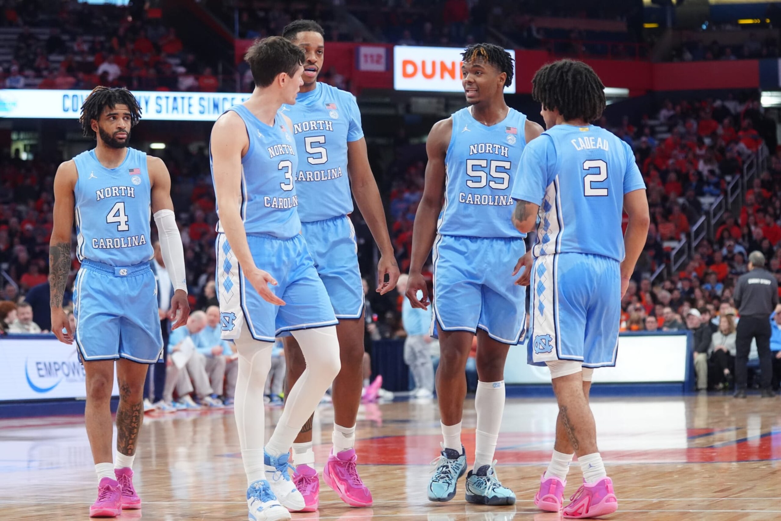 SYRACUSE, NY - FEBRUARY 13:  The North Carolina Tar Heels huddle during the second half of the College Basketball game between the North Carolina Tar Heels and the Syracuse Orange on February 13, 2024, at the JMA Wireless Dome in Syracuse, NY. (Photo by Gregory Fisher/Icon Sportswire via Getty Images)