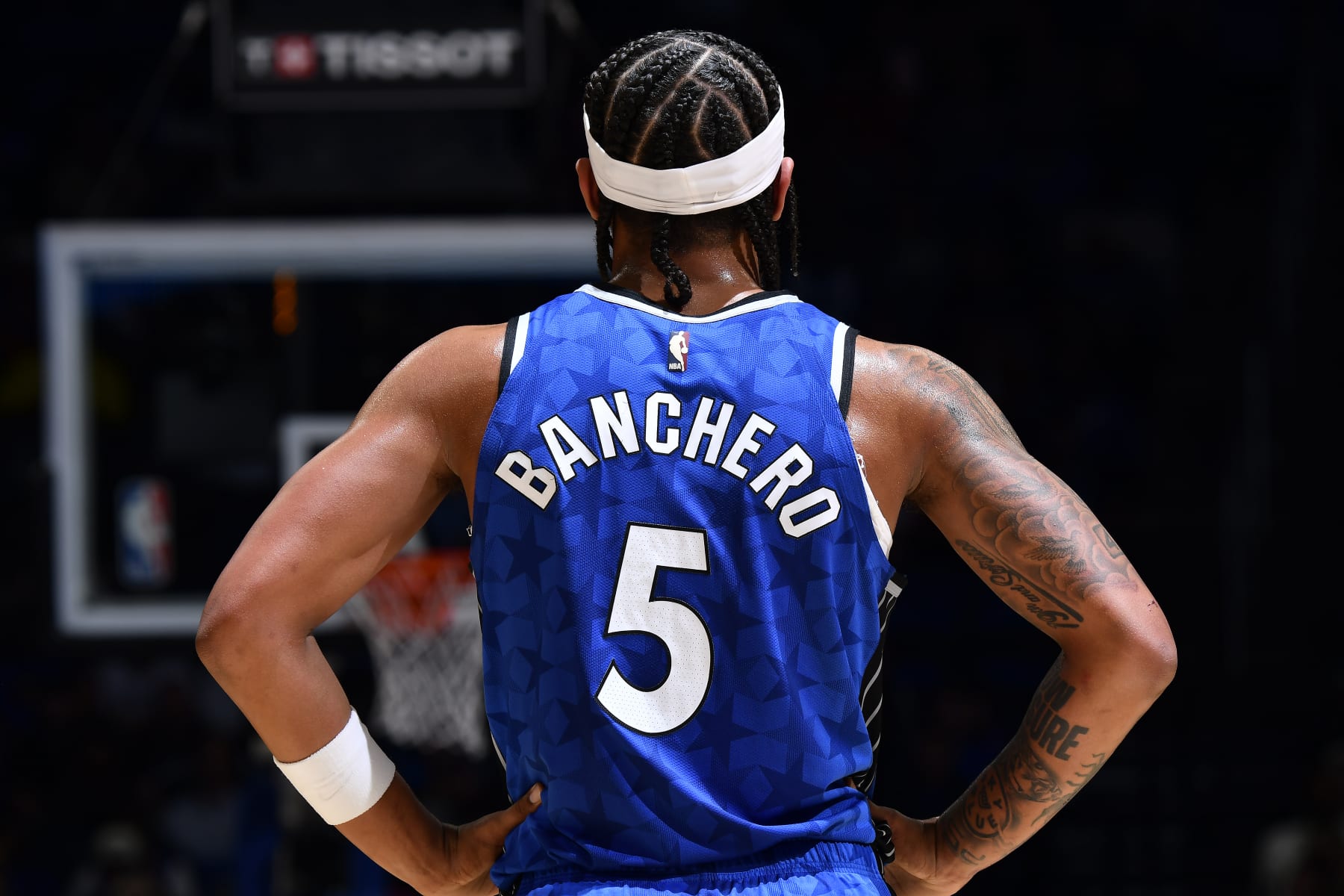 ORLANDO, FL - FEBRUARY 13: Paolo Banchero #5 of the Orlando Magic looks on during the game against the Oklahoma City Thunder on February 13, 2024 at the Kia Center in Orlando, Florida. NOTE TO USER: User expressly acknowledges and agrees that, by downloading and or using this photograph, User is consenting to the terms and conditions of the Getty Images License Agreement. Mandatory Copyright Notice: Copyright 2024 NBAE (Photo by Fernando Medina/NBAE via Getty Images)