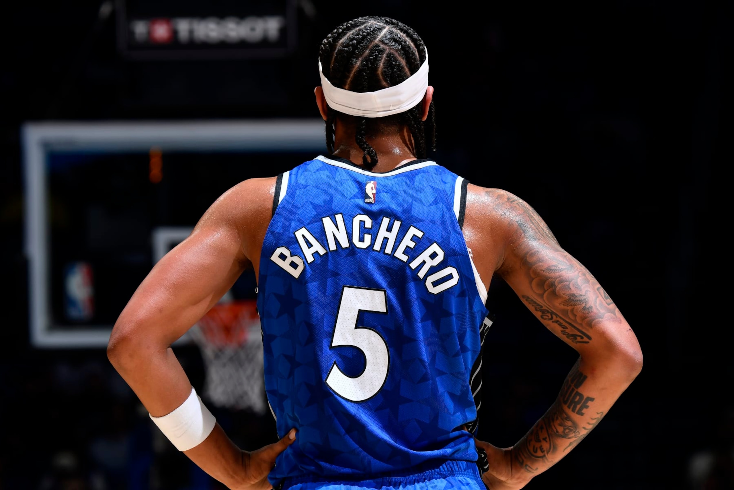 ORLANDO, FL - FEBRUARY 13: Paolo Banchero #5 of the Orlando Magic looks on during the game against the Oklahoma City Thunder on February 13, 2024 at the Kia Center in Orlando, Florida. NOTE TO USER: User expressly acknowledges and agrees that, by downloading and or using this photograph, User is consenting to the terms and conditions of the Getty Images License Agreement. Mandatory Copyright Notice: Copyright 2024 NBAE (Photo by Fernando Medina/NBAE via Getty Images)