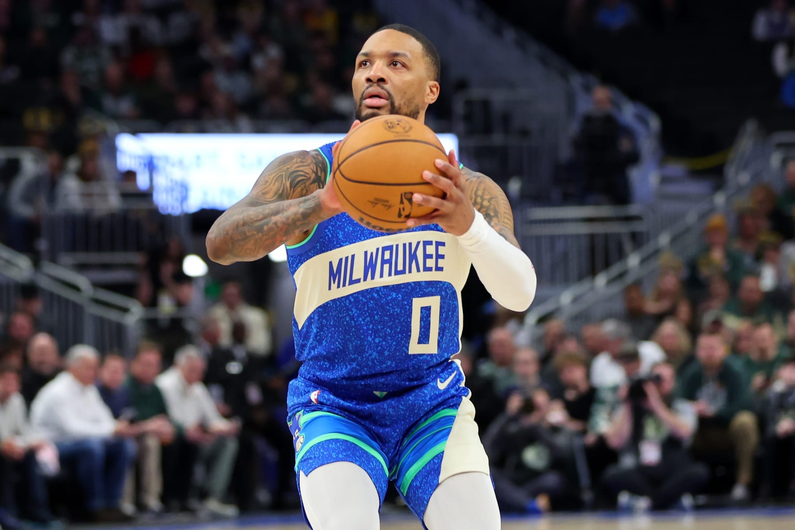 MILWAUKEE, WISCONSIN - FEBRUARY 13: Damian Lillard #0 of the Milwaukee Bucks takes a shot during a game against the Miami Heat at Fiserv Forum on February 13, 2024 in Milwaukee, Wisconsin. NOTE TO USER: User expressly acknowledges and agrees that, by downloading and or using this photograph, User is consenting to the terms and conditions of the Getty Images License Agreement. (Photo by Stacy Revere/Getty Images)