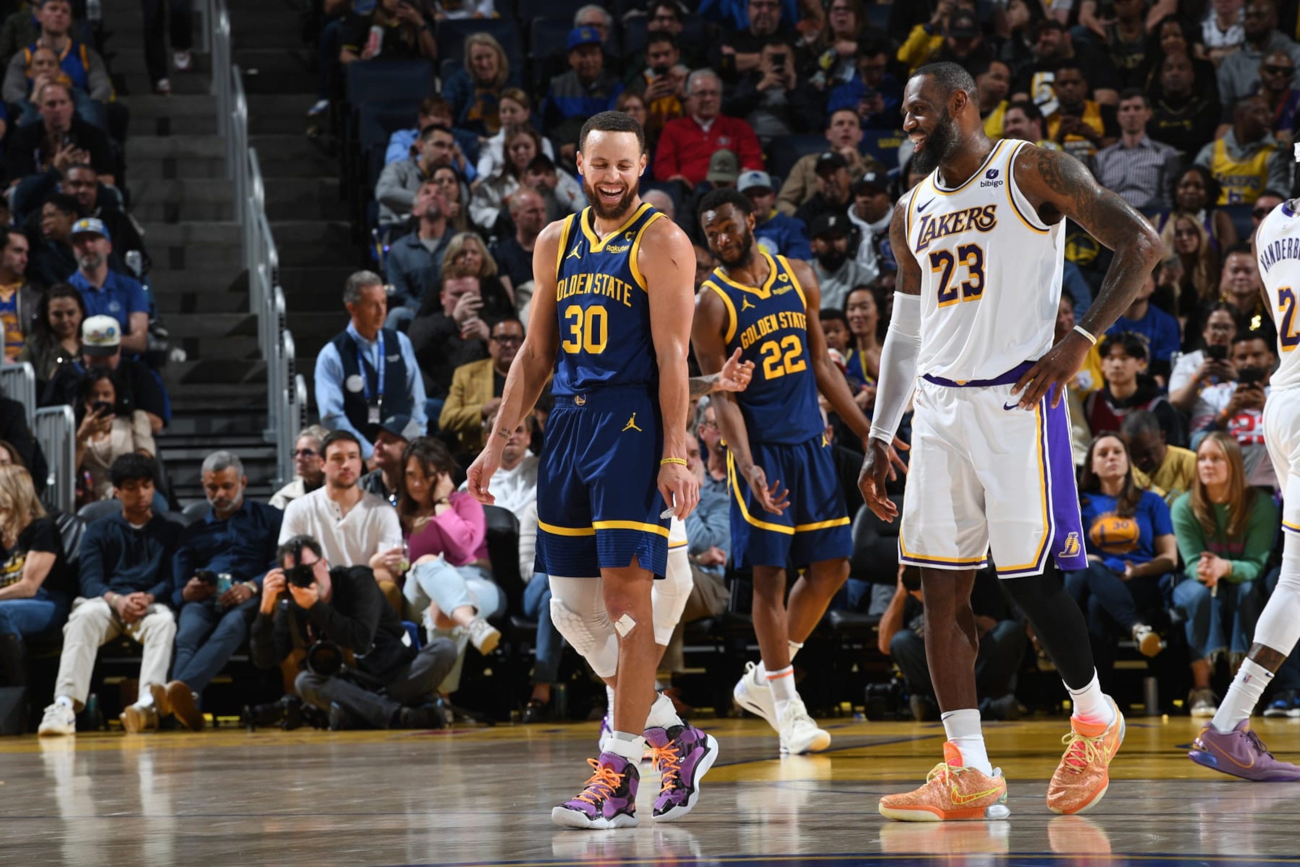 SAN FRANCISCO, CA - JANUARY 27: LeBron James #23 of the Los Angeles Lakers talks with Stephen Curry #30 of the Golden State Warriors during the game on January 27, 2024 at Chase Center in San Francisco, California. NOTE TO USER: User expressly acknowledges and agrees that, by downloading and or using this photograph, user is consenting to the terms and conditions of Getty Images License Agreement. Mandatory Copyright Notice: Copyright 2024 NBAE (Photo by Noah Graham/NBAE via Getty Images)