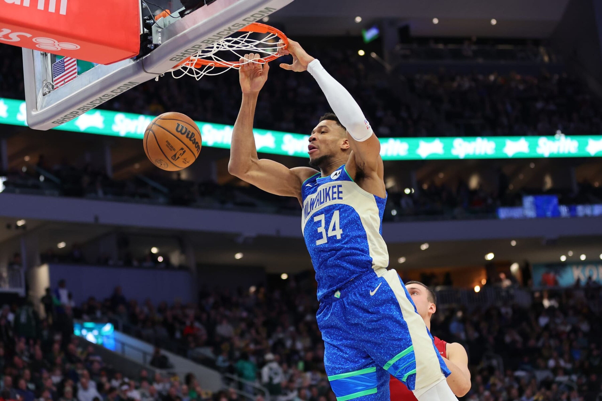 MILWAUKEE, WISCONSIN - FEBRUARY 13: Giannis Antetokounmpo #34 of the Milwaukee Bucks dunks against the Miami Heat during the first half of a game at Fiserv Forum on February 13, 2024 in Milwaukee, Wisconsin. NOTE TO USER: User expressly acknowledges and agrees that, by downloading and or using this photograph, User is consenting to the terms and conditions of the Getty Images License Agreement. (Photo by Stacy Revere/Getty Images)