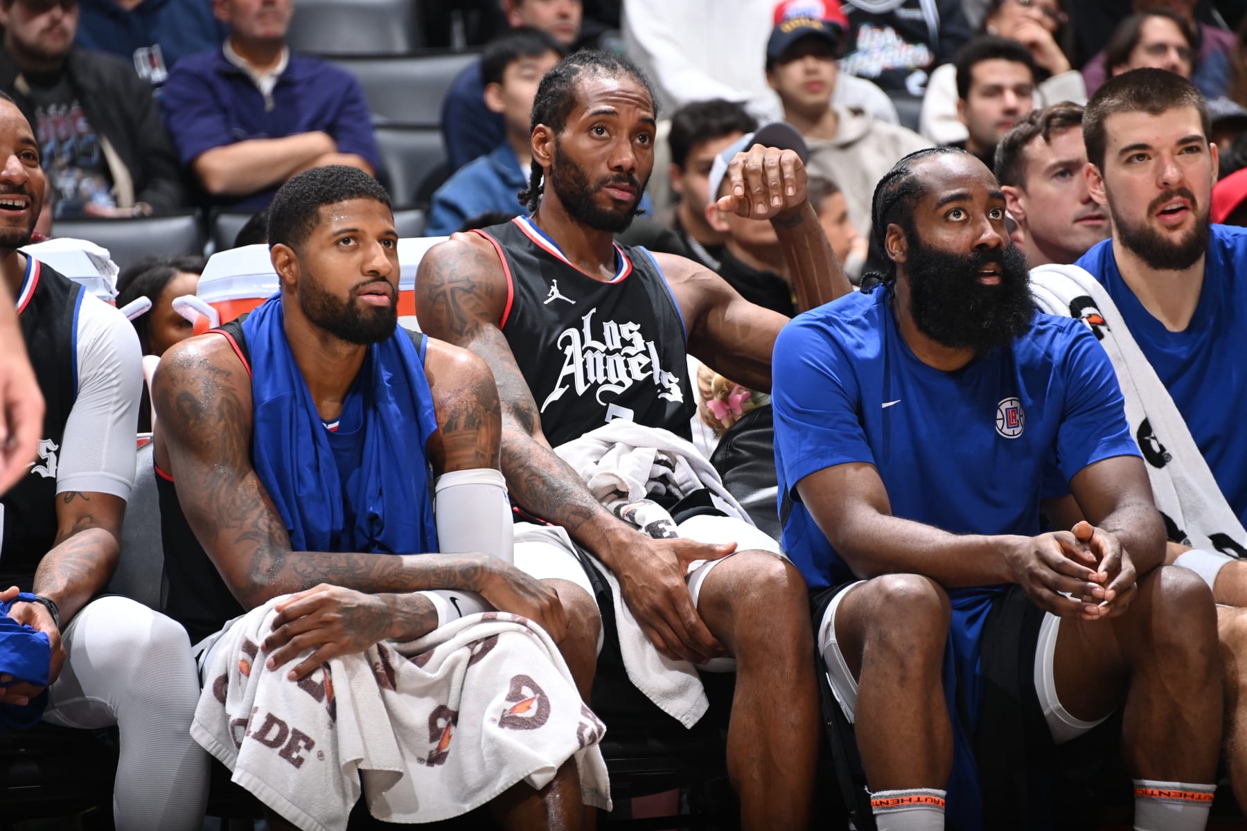LOS ANGELES, CA - NOVEMBER 25: Paul George #13 of the LA Clippers, Kawhi Leonard #2 of the LA Clippers and James Harden #1 of the LA Clippers look on during the game against the Dallas Mavericks on November 25, 2023 at Crypto.Com Arena in Los Angeles, California. NOTE TO USER: User expressly acknowledges and agrees that, by downloading and/or using this Photograph, user is consenting to the terms and conditions of the Getty Images License Agreement. Mandatory Copyright Notice: Copyright 2023 NBAE (Photo by Andrew D. Bernstein/NBAE via Getty Images)