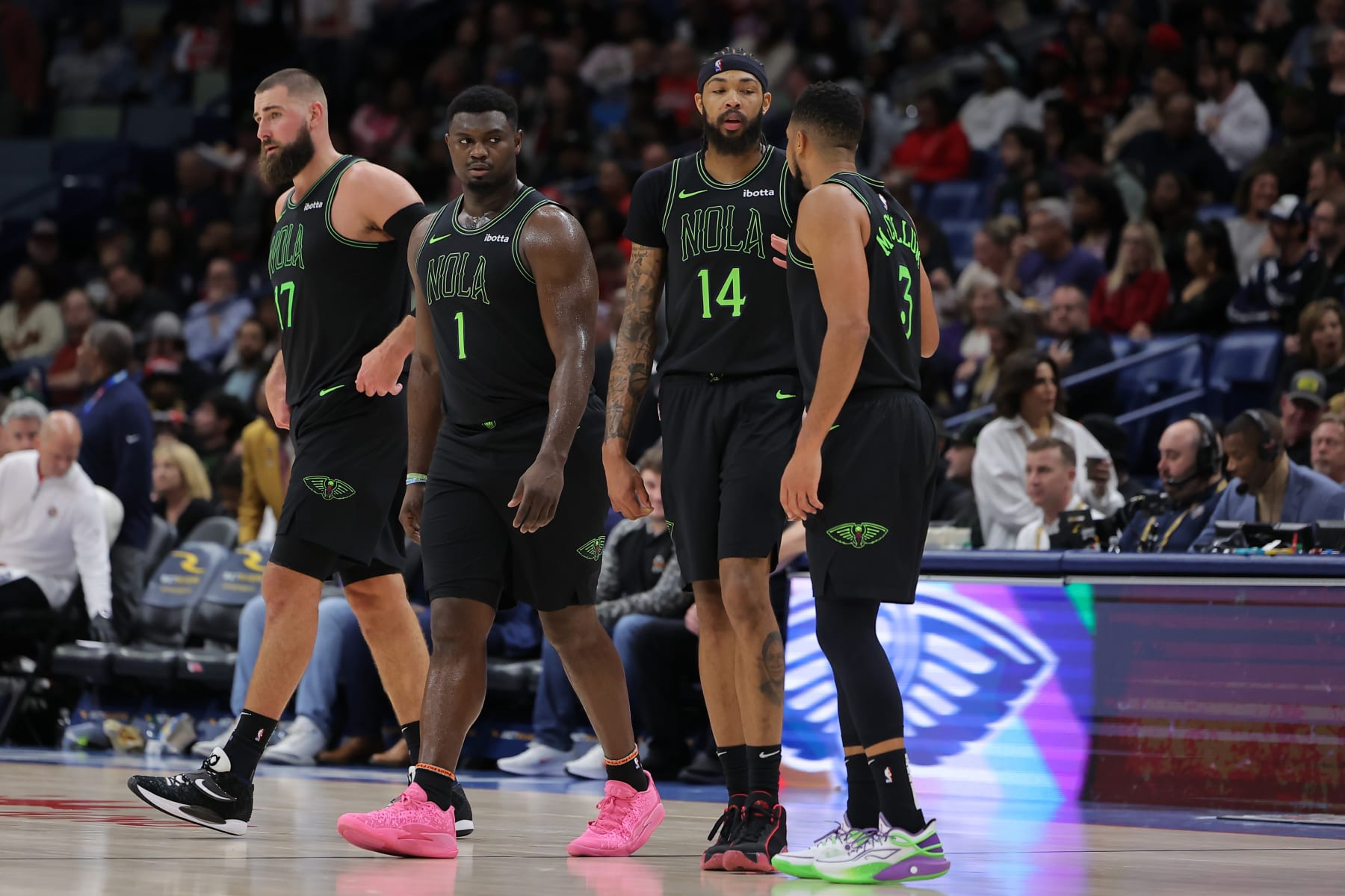 NEW ORLEANS, LOUISIANA - DECEMBER 01: Zion Williamson #1, CJ McCollum #3, Brandon Ingram #14 and Jonas Valanciunas #17 of the New Orleans Pelicans react during a game against the San Antonio Spurs at the Smoothie King Center on December 01, 2023 in New Orleans, Louisiana. NOTE TO USER: User expressly acknowledges and agrees that, by downloading and or using this Photograph, user is consenting to the terms and conditions of the Getty Images License Agreement. (Photo by Jonathan Bachman/Getty Images)