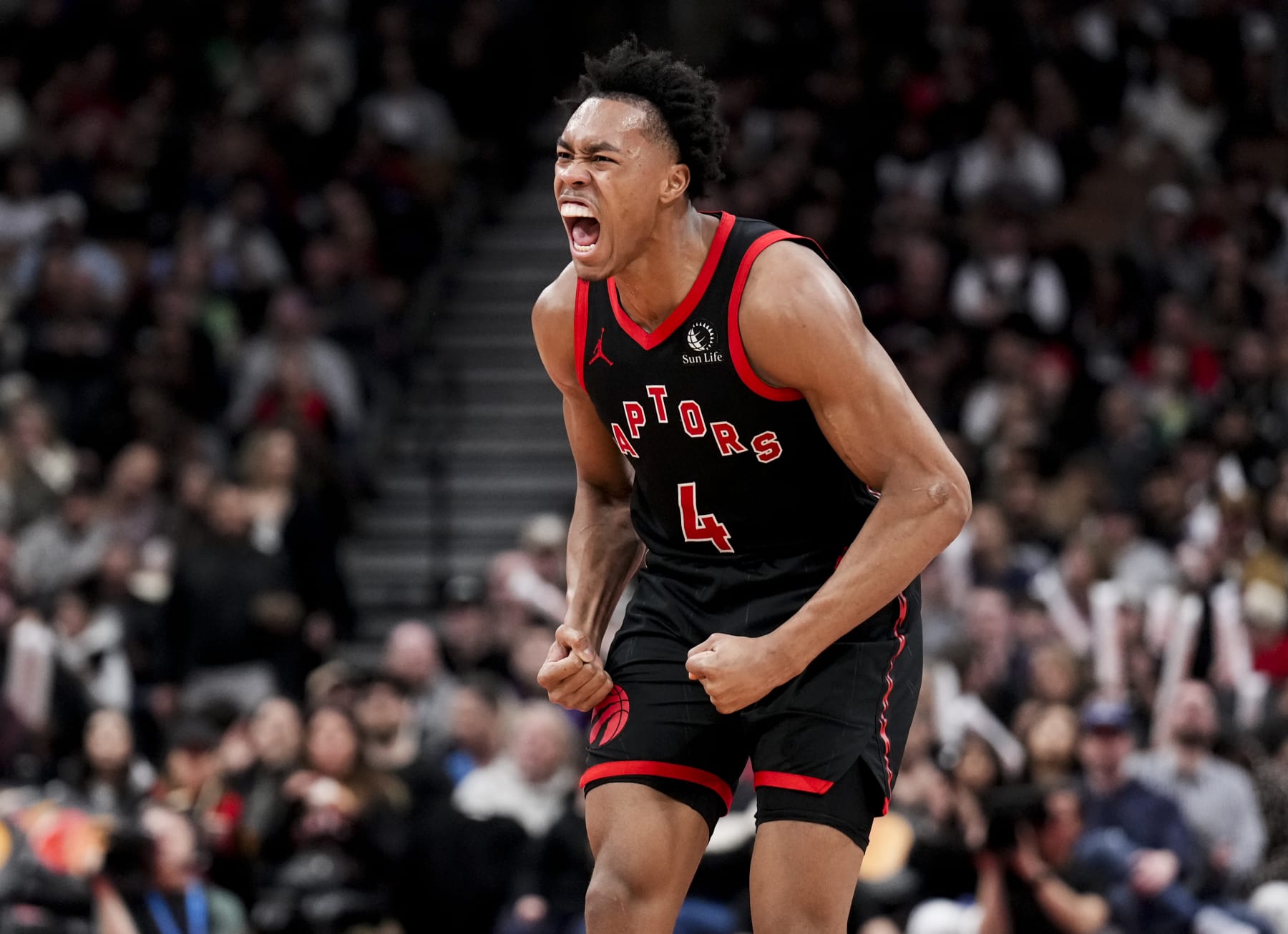 TORONTO, ON - FEBRUARY 10: Scottie Barnes #4 of the Toronto Raptors celebrates against the Cleveland Cavaliers during the second half of their basketball game at the Scotiabank Arena on February 10, 2024 in Toronto, Ontario, Canada. NOTE TO USER: User expressly acknowledges and agrees that, by downloading and/or using this Photograph, user is consenting to the terms and conditions of the Getty Images License Agreement. (Photo by Mark Blinch/Getty Images)