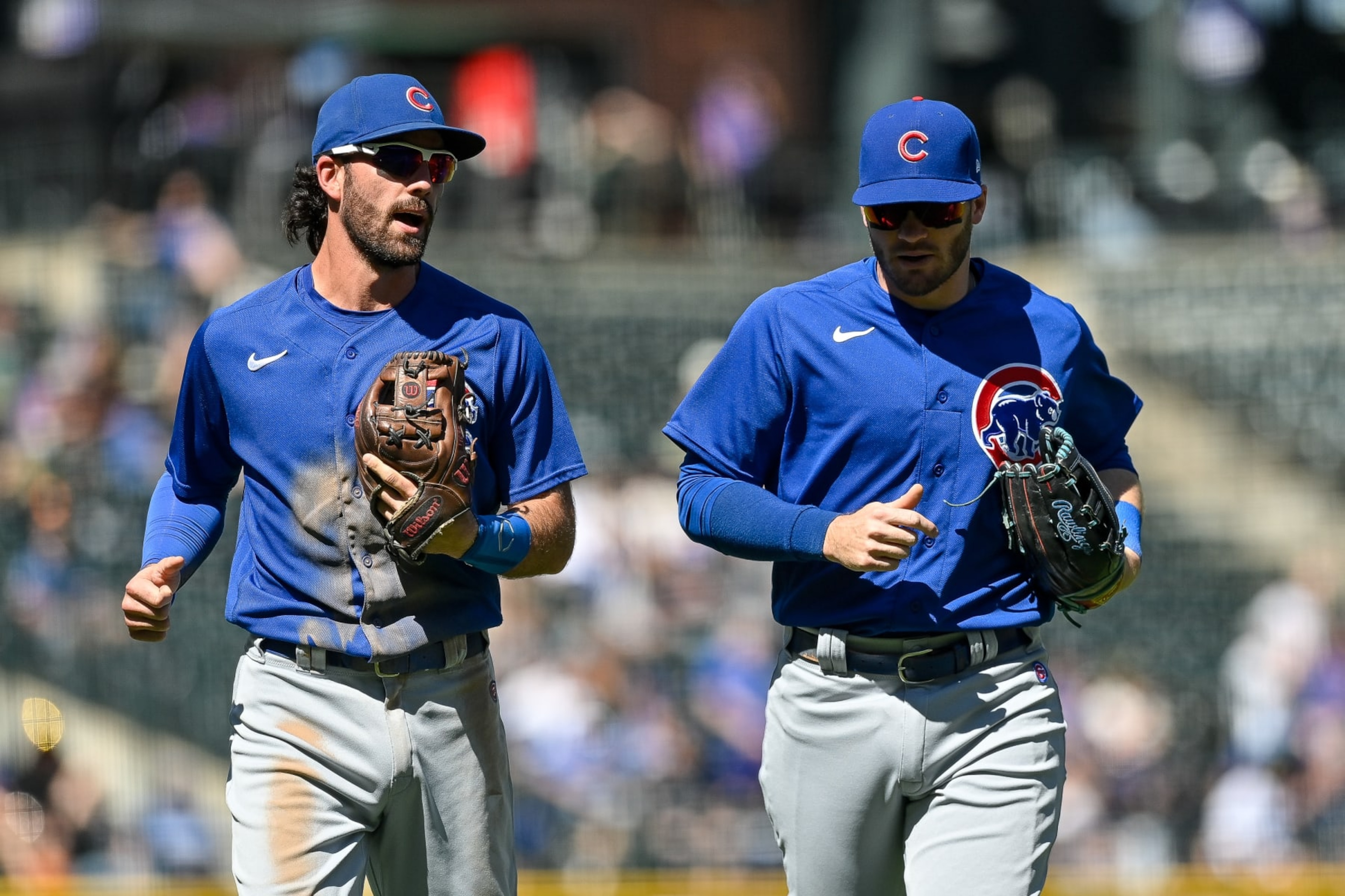 Dansby Swanson (L) and Ian Happ (R) Dansby Swanson (L) and Ian Happ (R)