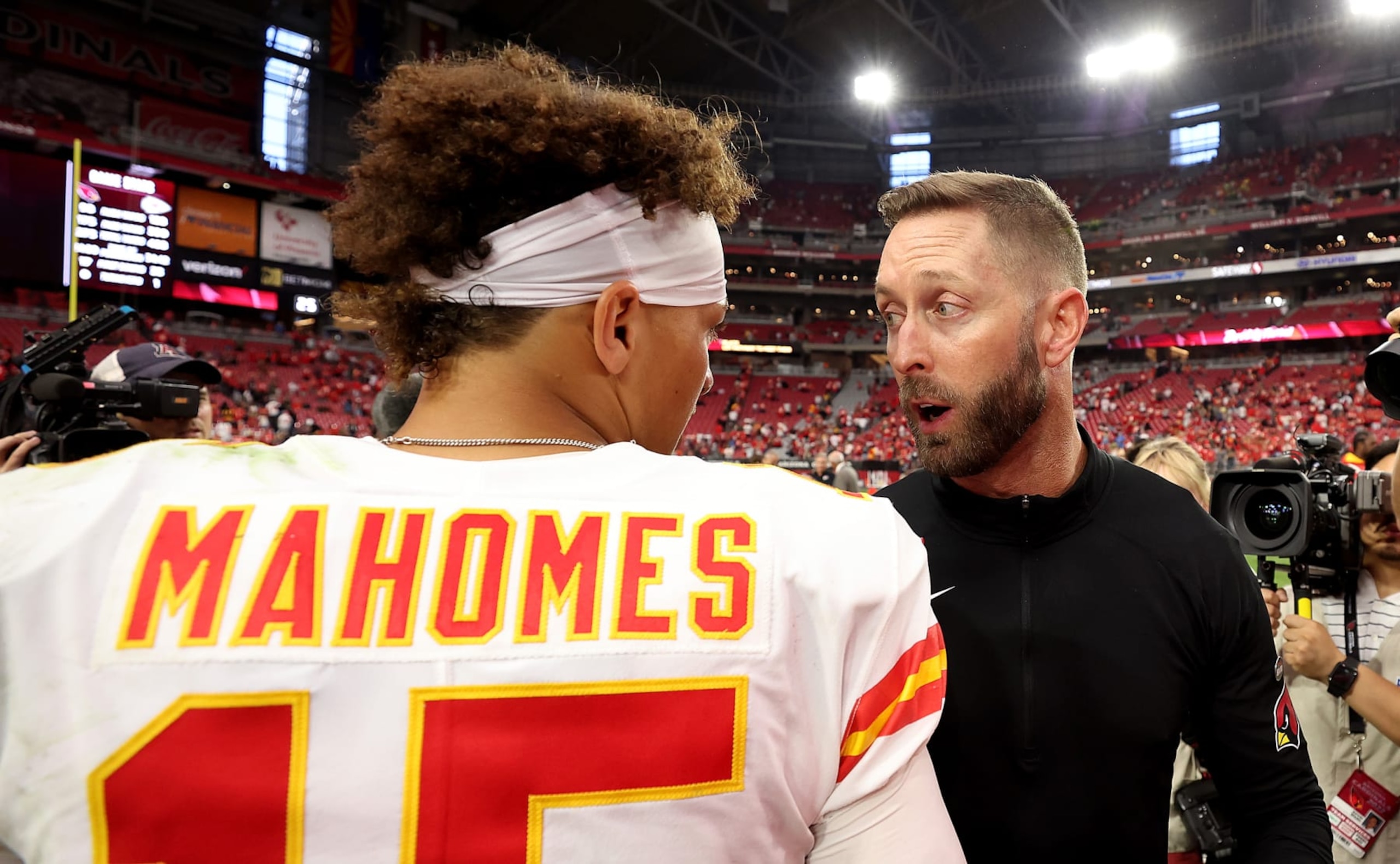 GLENDALE, ARIZONA - SEPTEMBER 11: Quarterback Patrick Mahomes #15 of the Kansas City Chiefs greets head coach Kliff Kingsbury of the Arizona Cardinals after the game at State Farm Stadium on September 11, 2022 in Glendale, Arizona. The Chiefs won 44-21. (Photo by Christian Petersen/Getty Images)