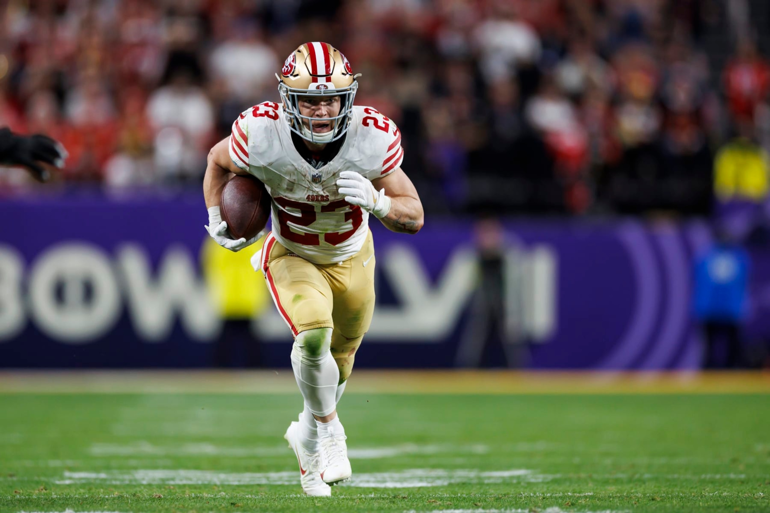 LAS VEGAS, NEVADA - FEBRUARY 11: Christian McCaffrey #23 of the San Francisco 49ers runs the ball to score a touchdown during Super Bowl LVIII against the Kansas City Chiefs at Allegiant Stadium on February 11, 2024 in Las Vegas, Nevada. (Photo by Ryan Kang/Getty Images)