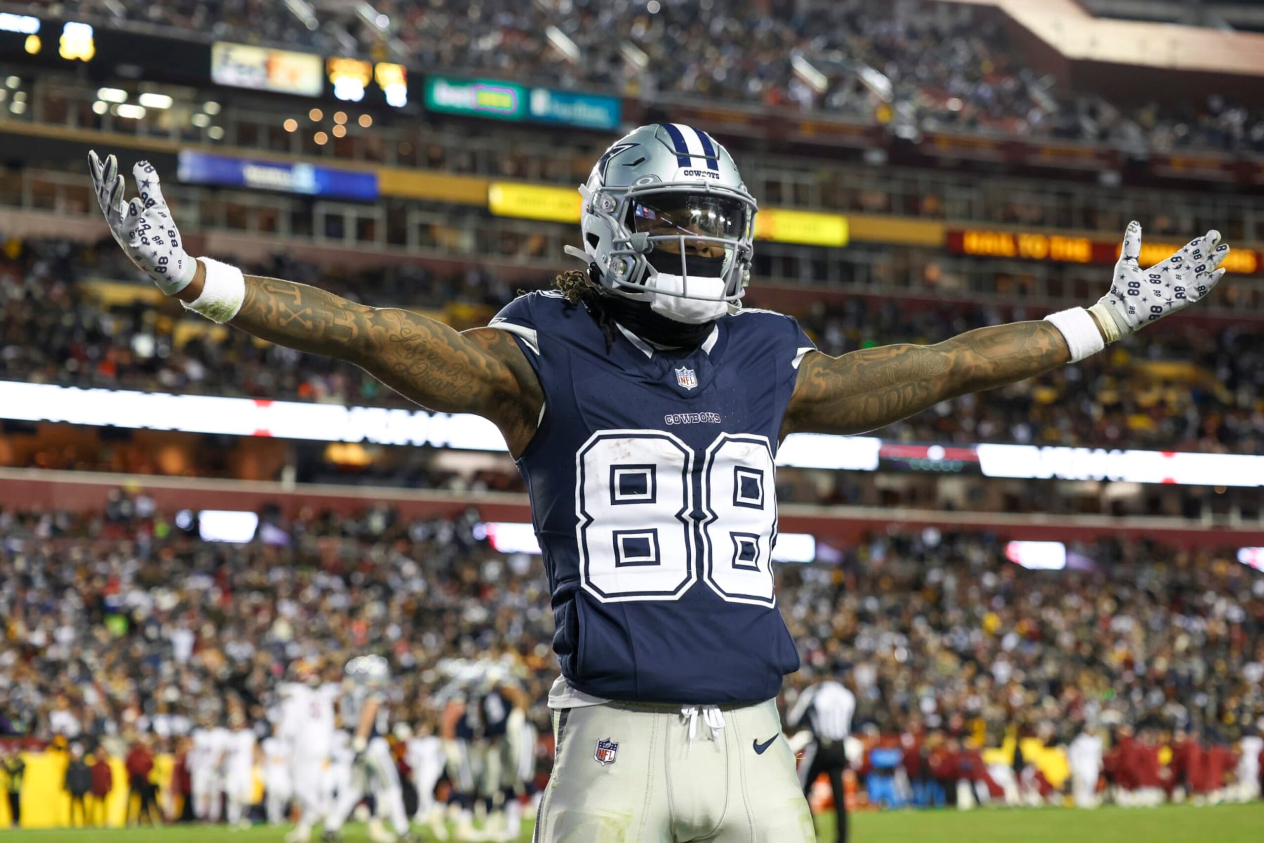 LANDOVER, MARYLAND - JANUARY 07: CeeDee Lamb #88 of the Dallas Cowboys celebrates a touchdown during an NFL football game against the Washington Commanders at FedExField on January 7, 2024 in Landover, Maryland. (Photo by Kara Durrette/Getty Images)