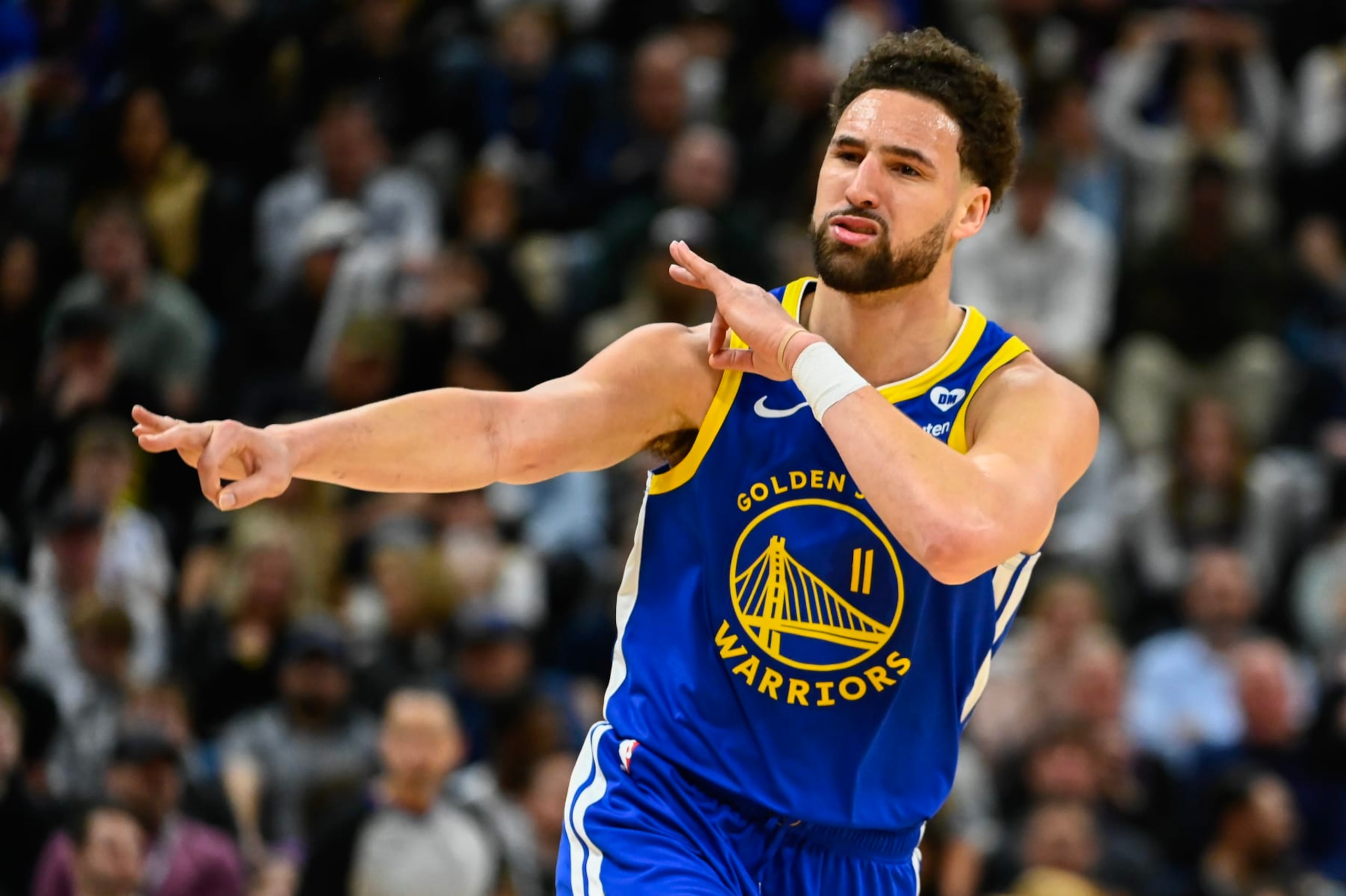 SALT LAKE CITY, UTAH - FEBRUARY 15: Klay Thompson #11 of the Golden State Warriors celebrates a three point shot during the second half of a game against the Utah Jazz at Delta Center on February 15, 2024 in Salt Lake City, Utah. NOTE TO USER: User expressly acknowledges and agrees that, by downloading and or using this photograph, User is consenting to the terms and conditions of the Getty Images License Agreement. (Photo by Alex Goodlett/Getty Images) SALT LAKE CITY, UTAH - FEBRUARY 15: Klay Thompson #11 of the Golden State Warriors celebrates a three point shot during the second half of a game against the Utah Jazz at Delta Center on February 15, 2024 in Salt Lake City, Utah. NOTE TO USER: User expressly acknowledges and agrees that, by downloading and or using this photograph, User is consenting to the terms and conditions of the Getty Images License Agreement. (Photo by Alex Goodlett/Getty Images)