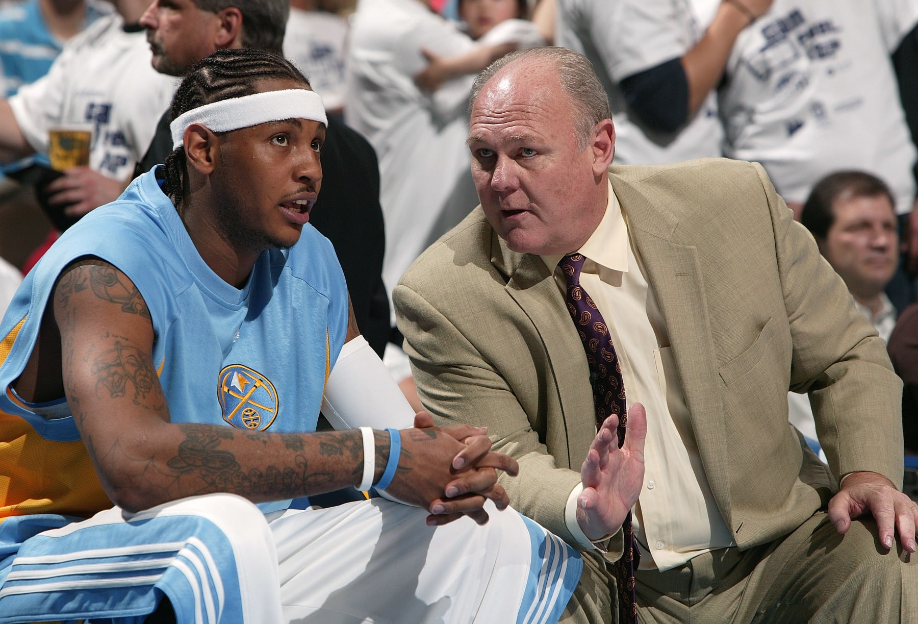 DENVER - APRIL 28: Carmelo Anthony #15 and head coach George Karl of the Denver Nuggets sit and talk during a time out against the Los Angeles Lakers in Game Four of the Western Conference Quarterfinals during the 2008 NBA Playoffs on April 28, 2008 at the Pepsi Center in Denver, Colorado. NOTE TO USER: User expressly acknowledges and agrees that, by downloading and/or using this Photograph, user is consenting to the terms and conditions of the Getty Images License Agreement. Mandatory Copyright Notice: Copyright 2008 NBAE  (Photo by Garrett W. Ellwood/NBAE via Getty Images)