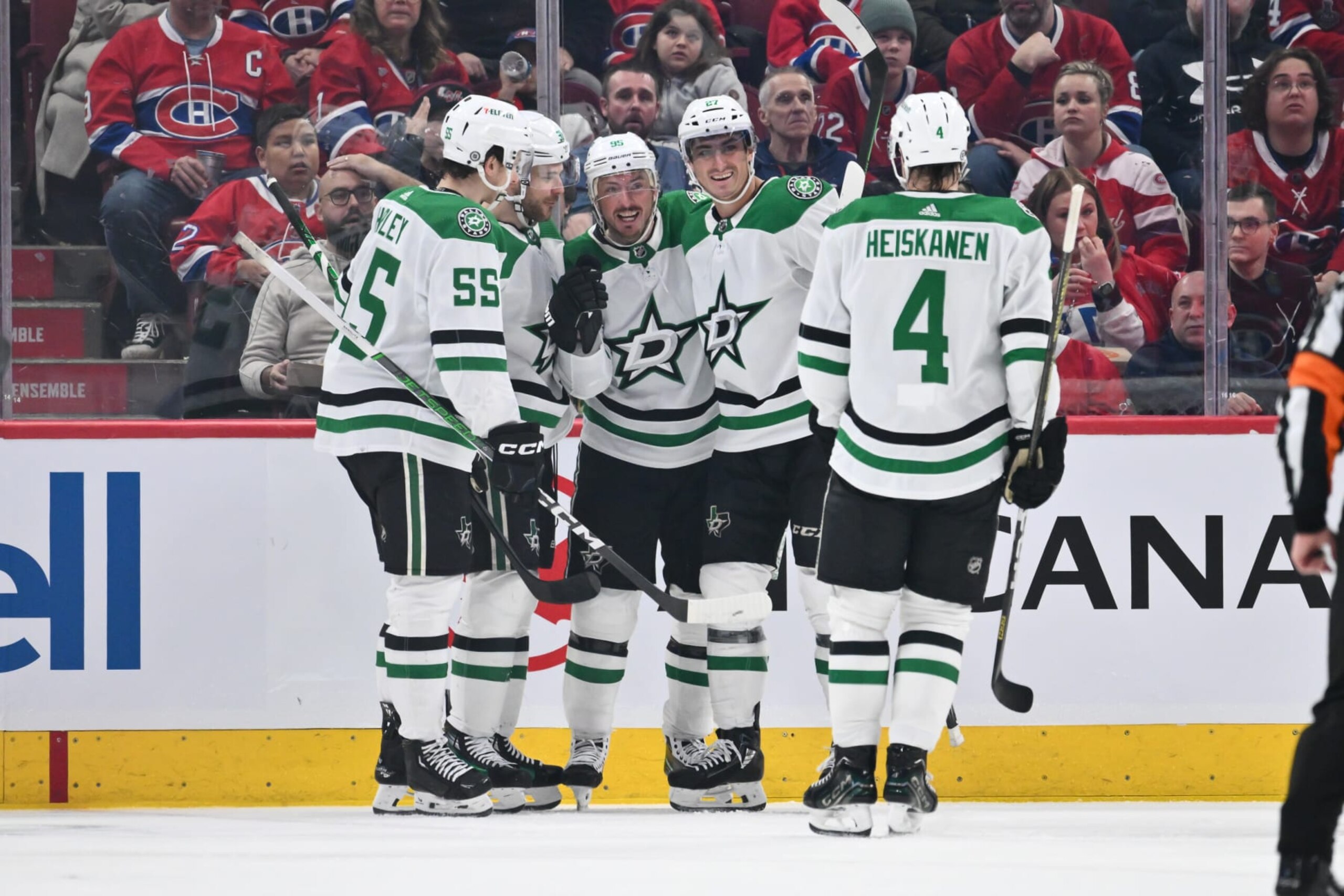 MONTREAL, CANADA - FEBRUARY 10:  Tyler Seguin #91 of the Dallas Stars celebrates his goal with teammates Thomas Harley #55, Matt Duchene #95, Mason Marchment #27 and Miro Heiskanen #4 during the second period against the Montreal Canadiens at the Bell Centre on February 10, 2024 in Montreal, Quebec, Canada.  (Photo by Minas Panagiotakis/Getty Images)