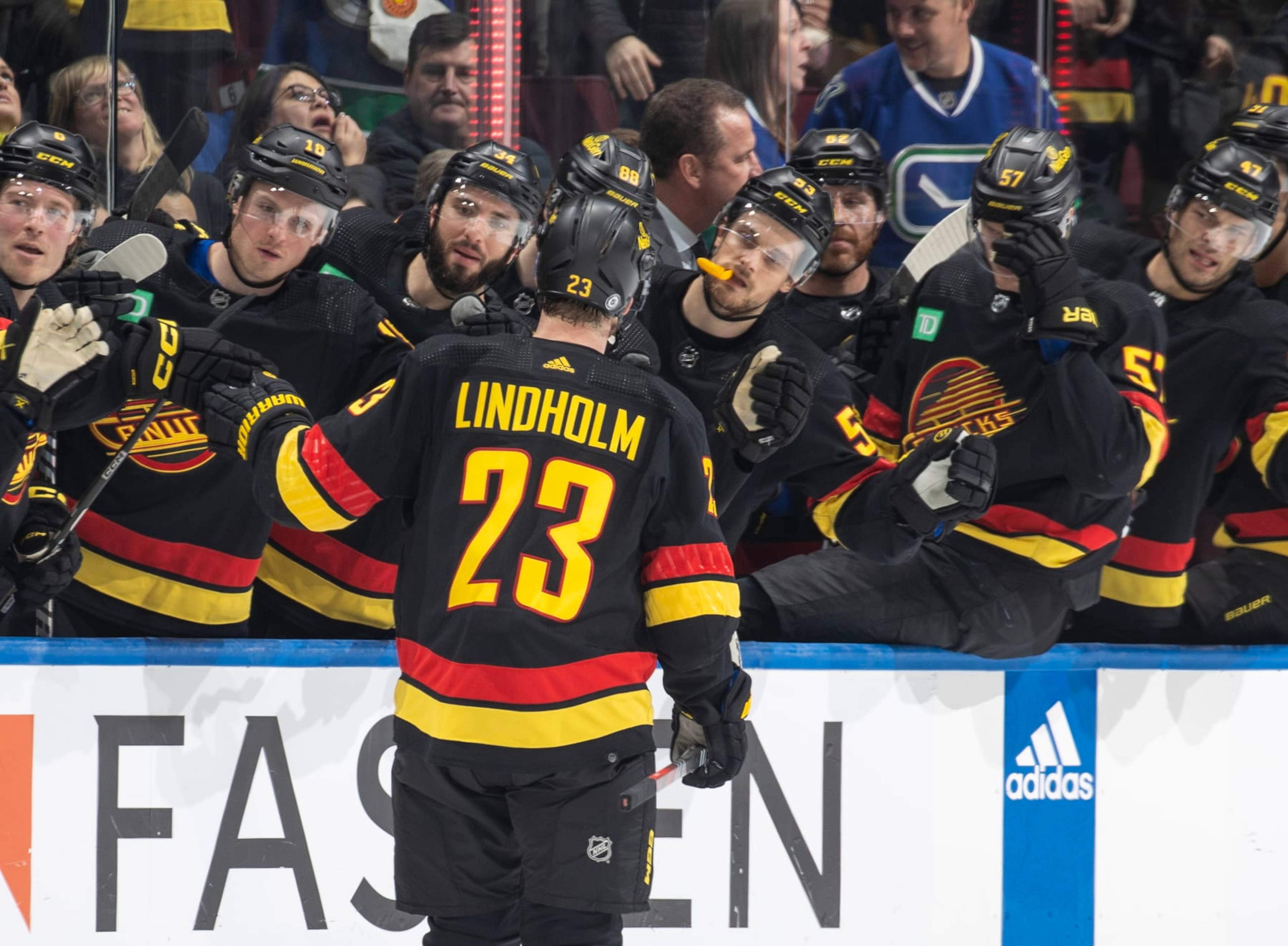 VANCOUVER, CANADA - FEBRUARY 15: Elias Lindholm #23 of the Vancouver Canucks celebrates his goal with teammates during the third period of their NHL game against the Detroit Red Wings at Rogers Arena on February 15, 2024 in Vancouver, British Columbia, Canada. (Photo by Jeff Vinnick/NHLI via Getty Images) VANCOUVER, CANADA - FEBRUARY 15: Elias Lindholm #23 of the Vancouver Canucks celebrates his goal with teammates during the third period of their NHL game against the Detroit Red Wings at Rogers Arena on February 15, 2024 in Vancouver, British Columbia, Canada. (Photo by Jeff Vinnick/NHLI via Getty Images)