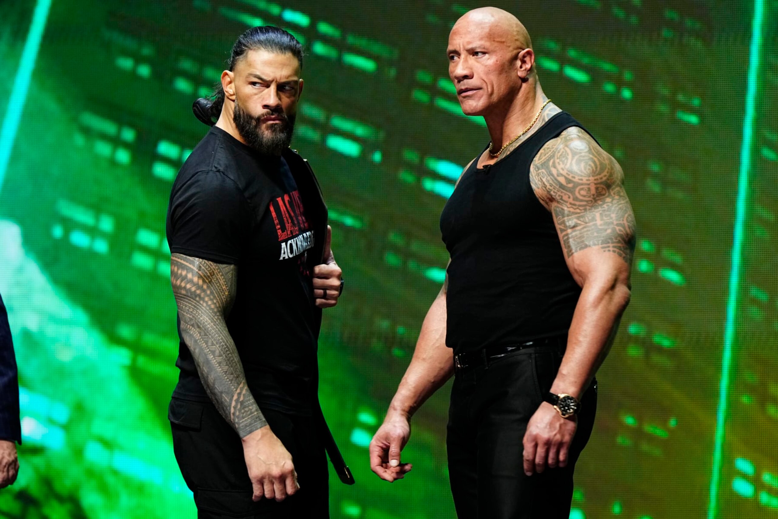 LAS VEGAS, NV - FEBRUARY 08: Dwayne "The Rock" Johnson and Roman Reigns during the WWE Wrestlemania XL Kickoff on February 08, 2024, at T-Mobile Arena in Las Vegas, NV. (Photo by Louis Grasse/PXimages/Icon Sportswire via Getty Images) LAS VEGAS, NV - FEBRUARY 08: Dwayne "The Rock" Johnson and Roman Reigns during the WWE Wrestlemania XL Kickoff on February 08, 2024, at T-Mobile Arena in Las Vegas, NV. (Photo by Louis Grasse/PXimages/Icon Sportswire via Getty Images)