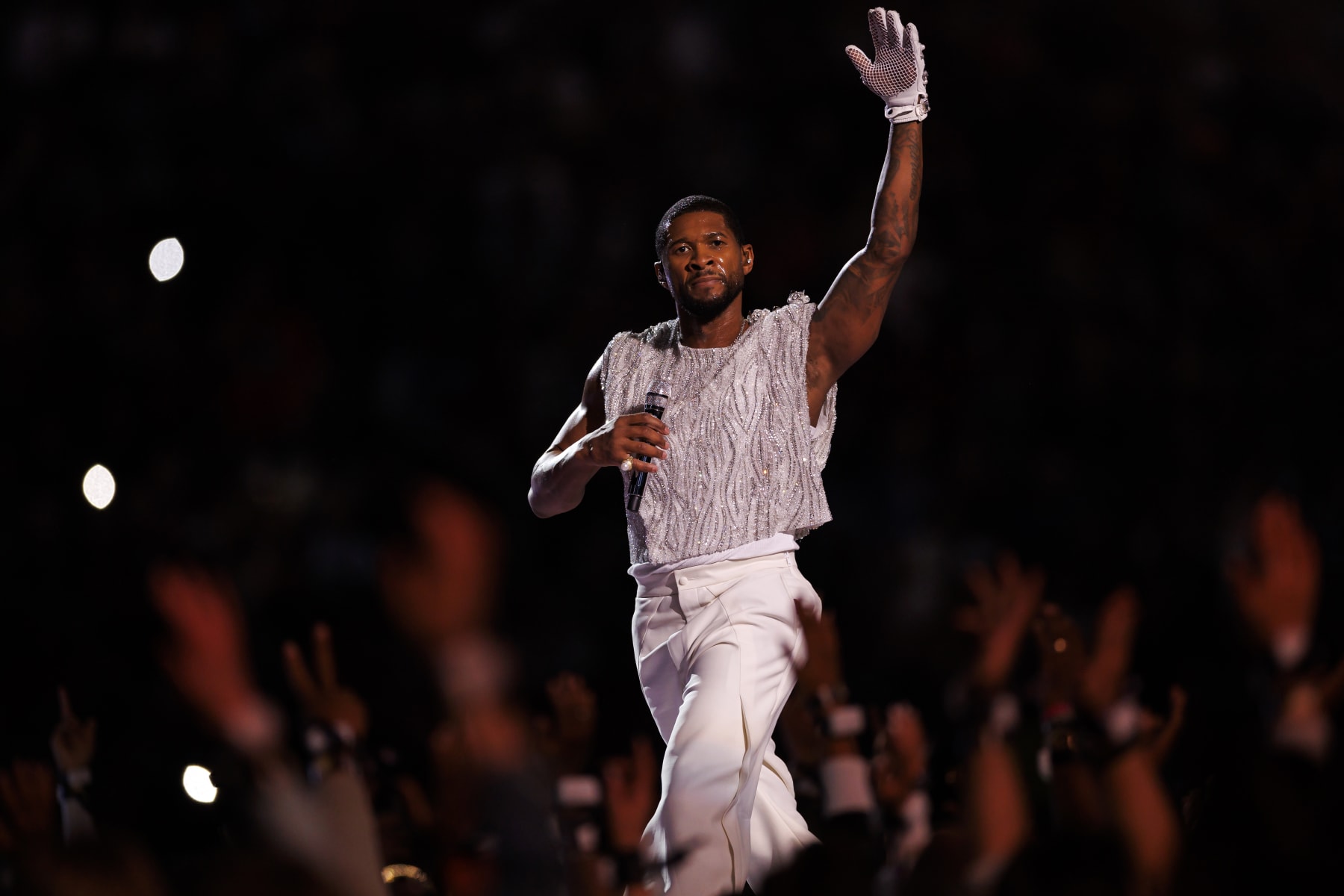 LAS VEGAS, NEVADA - FEBRUARY 11: Usher performs onstage during the Apple Music Super Bowl LVIII Halftime Show at Allegiant Stadium on February 11, 2024 in Las Vegas, Nevada. (Photo by Ryan Kang/Getty Images)