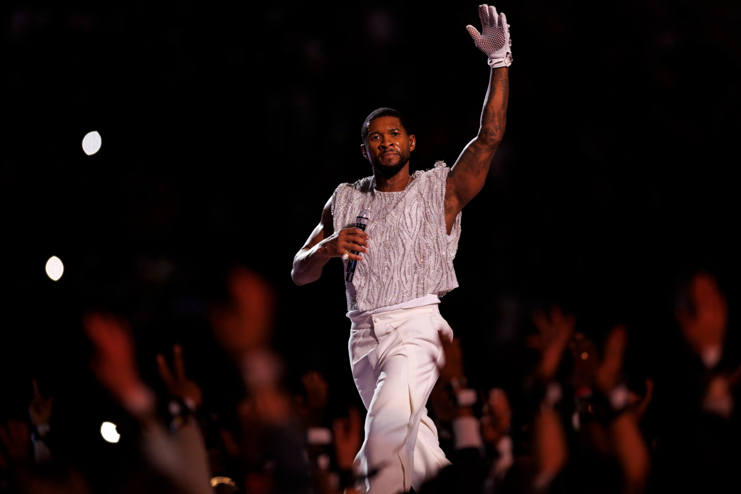 LAS VEGAS, NEVADA - FEBRUARY 11: Usher performs onstage during the Apple Music Super Bowl LVIII Halftime Show at Allegiant Stadium on February 11, 2024 in Las Vegas, Nevada. (Photo by Ryan Kang/Getty Images)