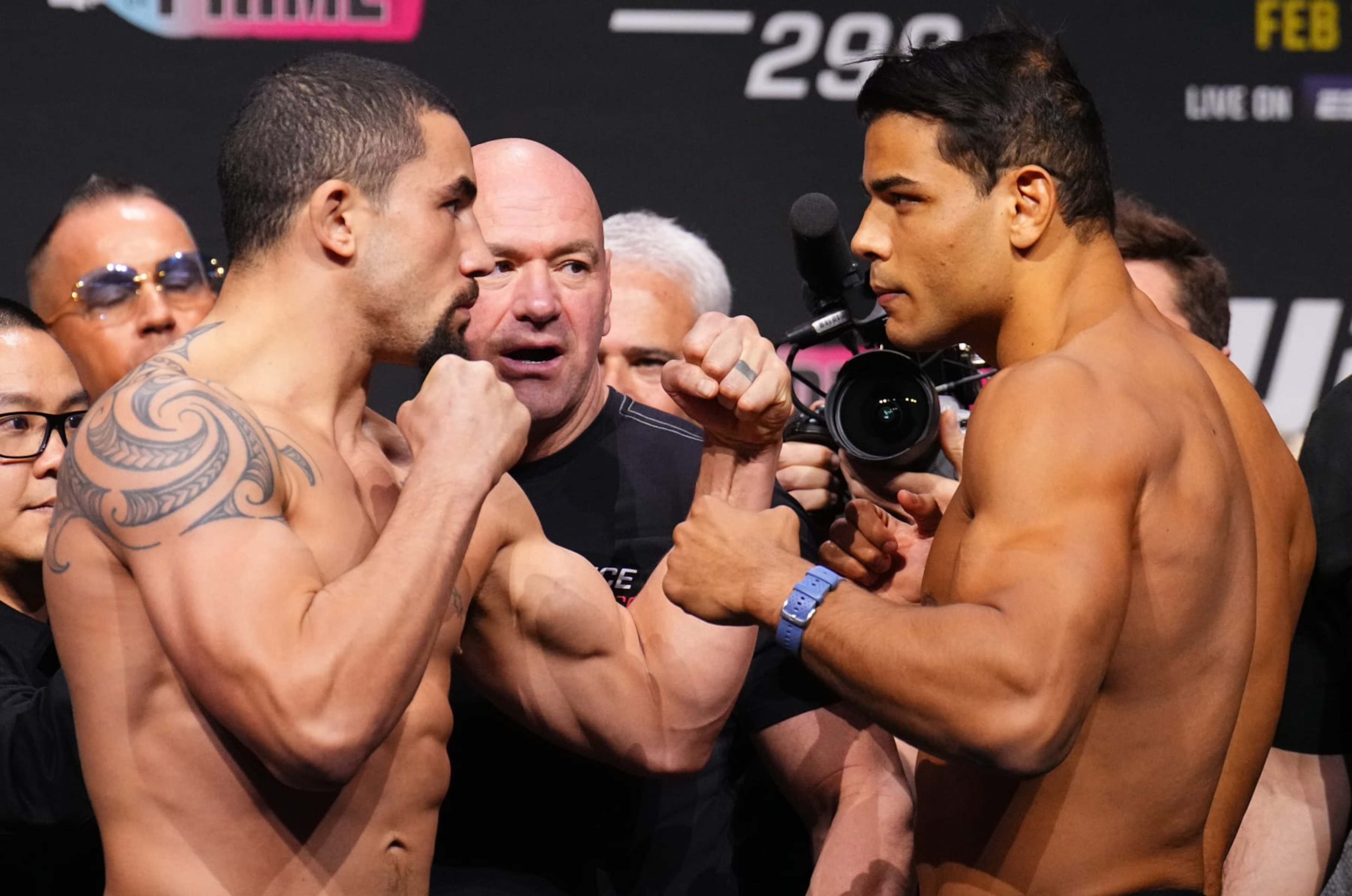 ANAHEIM, CALIFORNIA - FEBRUARY 16: (L-R) Opponents Robert Whittaker of New Zealand and Paulo Costa of Brazil face off during the UFC 298 ceremonial weigh-in at Honda Center on February 16, 2024 in Anaheim, California. (Photo by Chris Unger/Zuffa LLC via Getty Images) ANAHEIM, CALIFORNIA - FEBRUARY 16: (L-R) Opponents Robert Whittaker of New Zealand and Paulo Costa of Brazil face off during the UFC 298 ceremonial weigh-in at Honda Center on February 16, 2024 in Anaheim, California. (Photo by Chris Unger/Zuffa LLC via Getty Images)