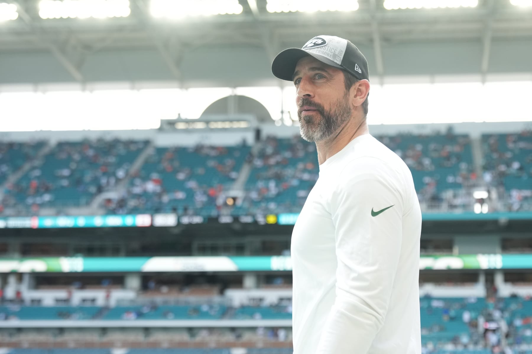 MIAMI GARDENS, FL - DECEMBER 17:  New York Jets' Aaron Rogers walks the sidelines before  the game between the New York Jets and the Miami Dolphins on Sunday, December 17, 2023 at Hard Rock Stadium, Hard Rock Stadium, Fla. (Photo by Peter Joneleit/Icon Sportswire via Getty Images)