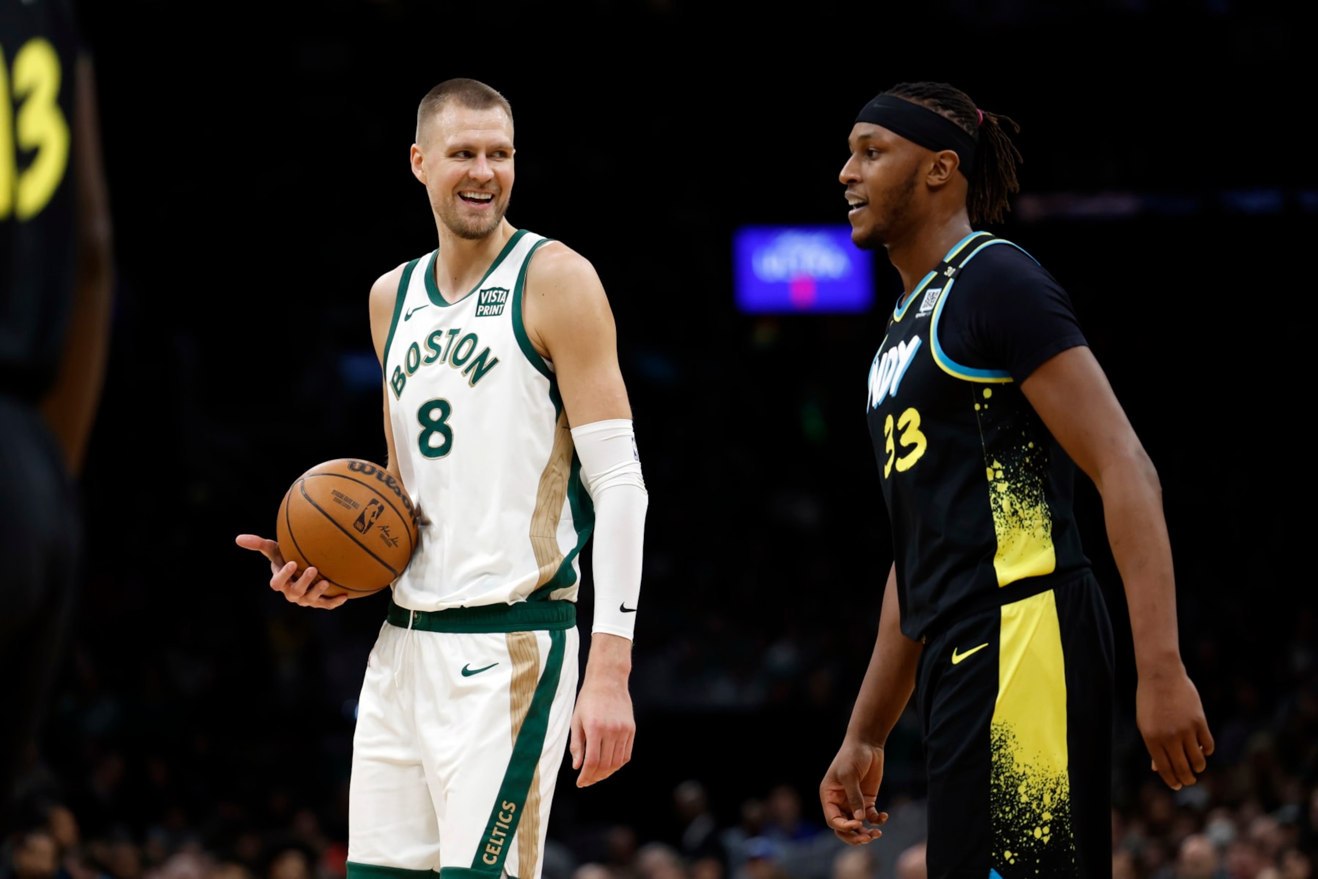Kristaps PorziÅÄ£is and Myles Turner