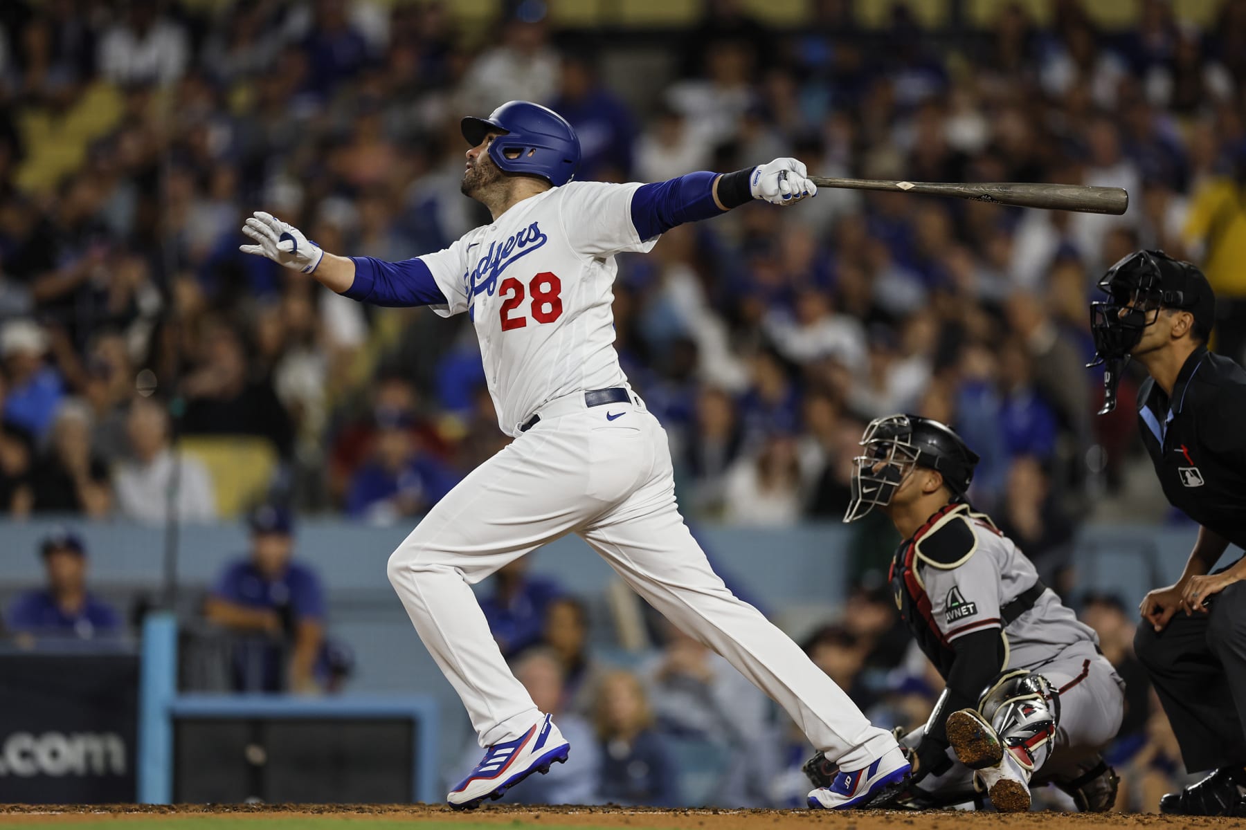 Los Angeles, CA, Monday, October 9, 2023 - Los Angeles Dodgers designated hitter J.D. Martinez (28) homers in the 4th inning of game two of the National League Division Series at Dodger Stadium.  (Robert Gauthier/Los Angeles Times via Getty Images)