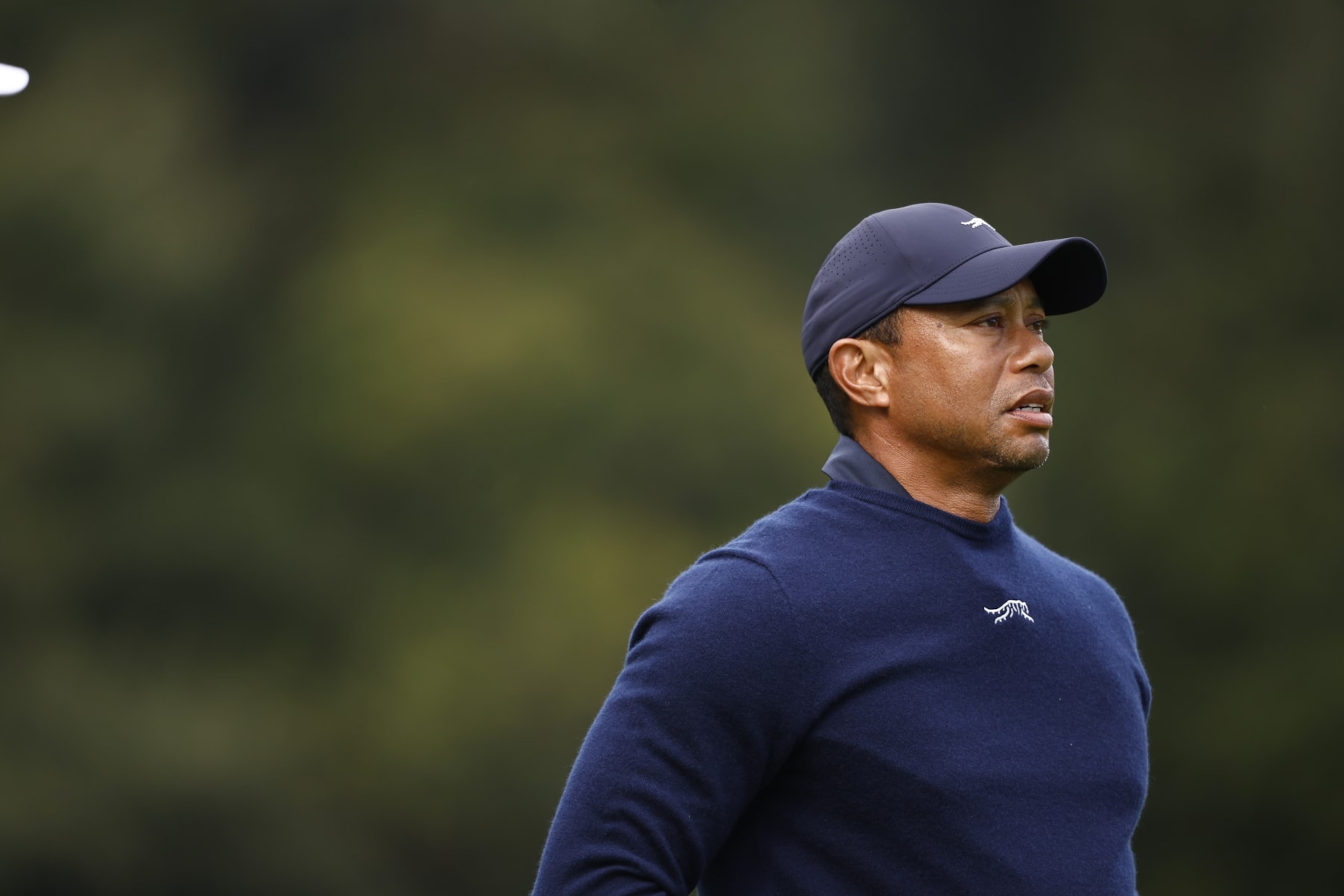 PACIFIC PALISADES, CALIFORNIA - FEBRUARY 16: Tiger Woods of the United States reacts to his shot from the sixth tee during the second round of The Genesis Invitational at Riviera Country Club on February 16, 2024 in Pacific Palisades, California. (Photo by Ronald Martinez/Getty Images)