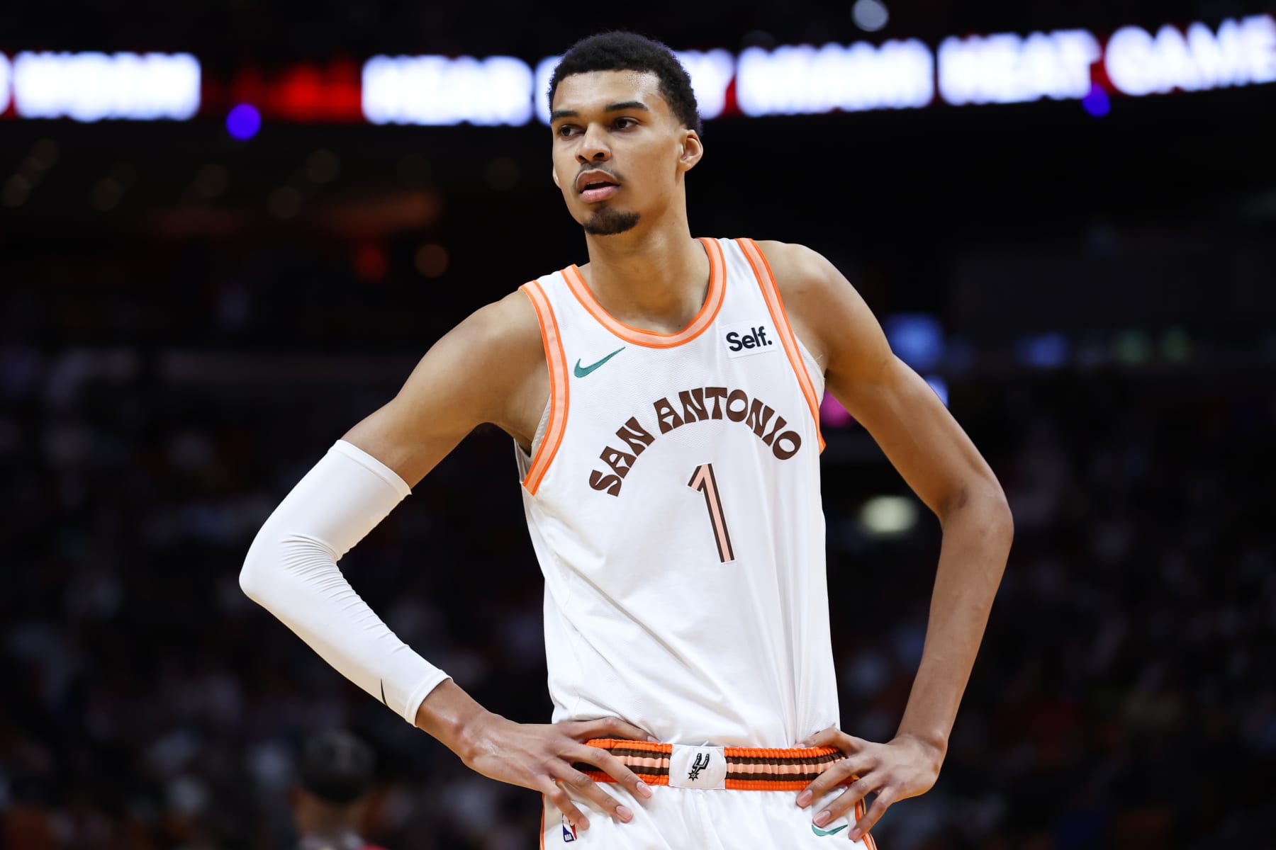 MIAMI, FLORIDA - FEBRUARY 07: Victor Wembanyama #1 of the San Antonio Spurs looks on during the fourth quarter of the game against the Miami Heat at Kaseya Center on February 07, 2024 in Miami, Florida. NOTE TO USER: User expressly acknowledges and agrees that, by downloading and or using this photograph, User is consenting to the terms and conditions of the Getty Images License Agreement. (Photo by Megan Briggs/Getty Images)
