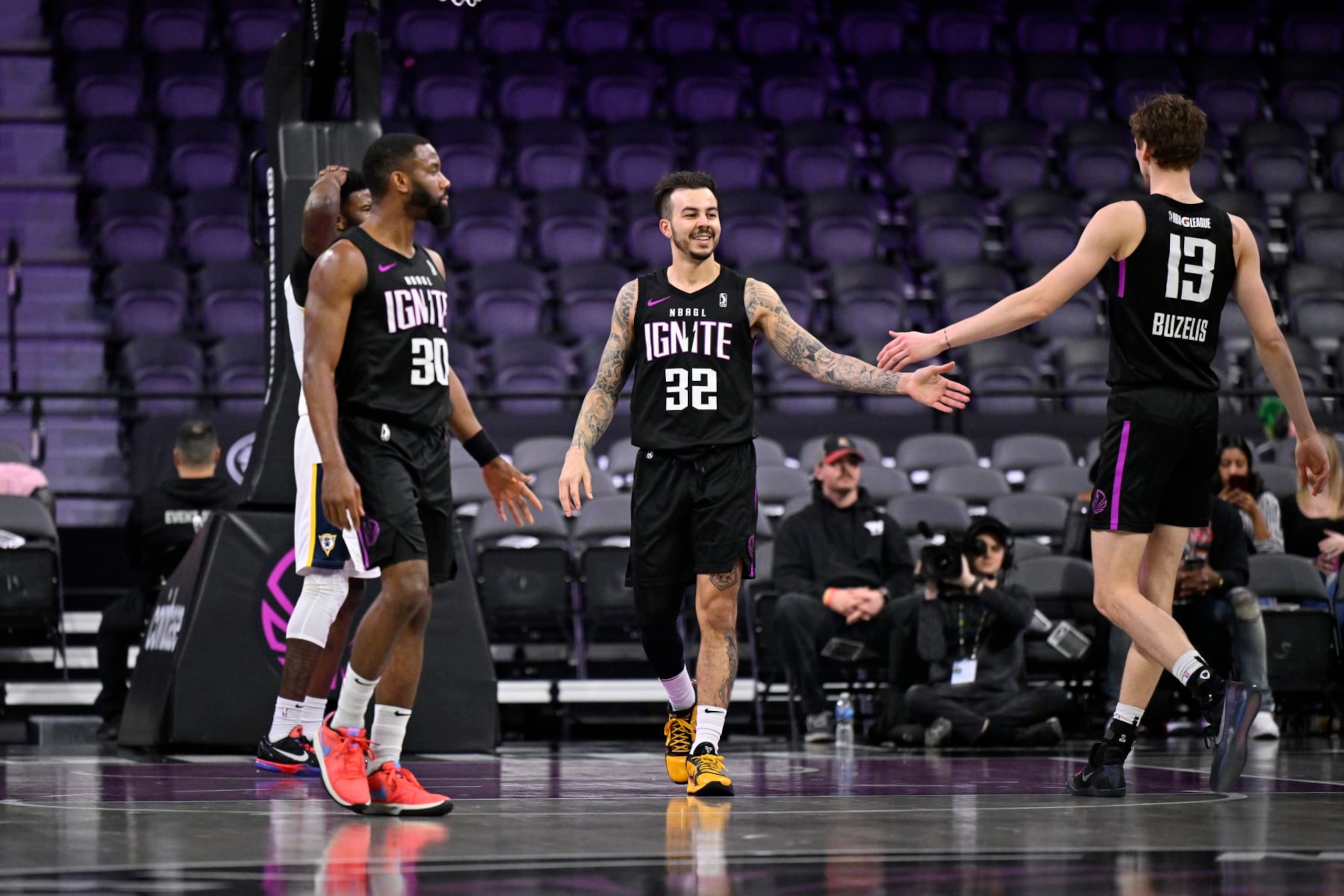 LAS VEGAS, NV - FEBRUARY 12: Gabe York #32 high fives Matas Buzelis #13 of G League Ignite  during the game against the Indiana Mad Ants on February 12, 2024 at The Dollar Loan Center in Henderson, Nevada. NOTE TO USER: User expressly acknowledges and agrees that, by downloading and or using this photograph, User is consenting to the terms and conditions of the Getty Images License Agreement. Mandatory Copyright Notice: Copyright 2024 NBAE (Photo by David Becker/NBAE via Getty Images)