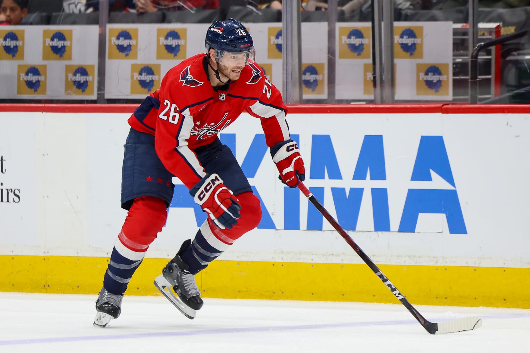 WASHINGTON, DC - FEBRUARY 11: Nic Dowd #26 of the Washington Capitals skates up the ice during a game against the Vancouver Canucks at Capital One Arena on February 11, 2024 in Washington, D.C. (Photo by John McCreary/NHLI via Getty Images)